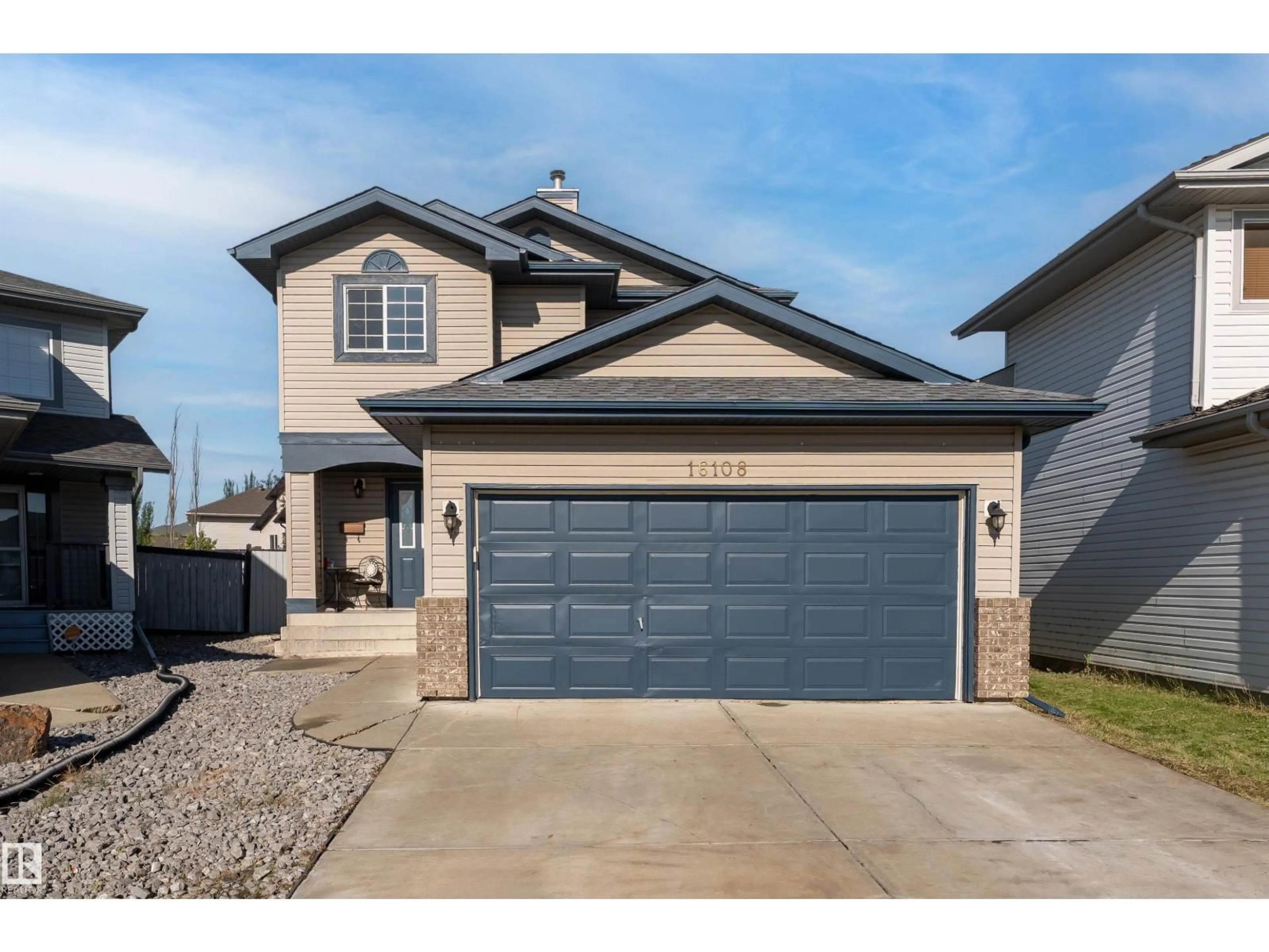 Home with vinyl exterior material, street for 16108 130 ST, Edmonton Alberta T6V1S9