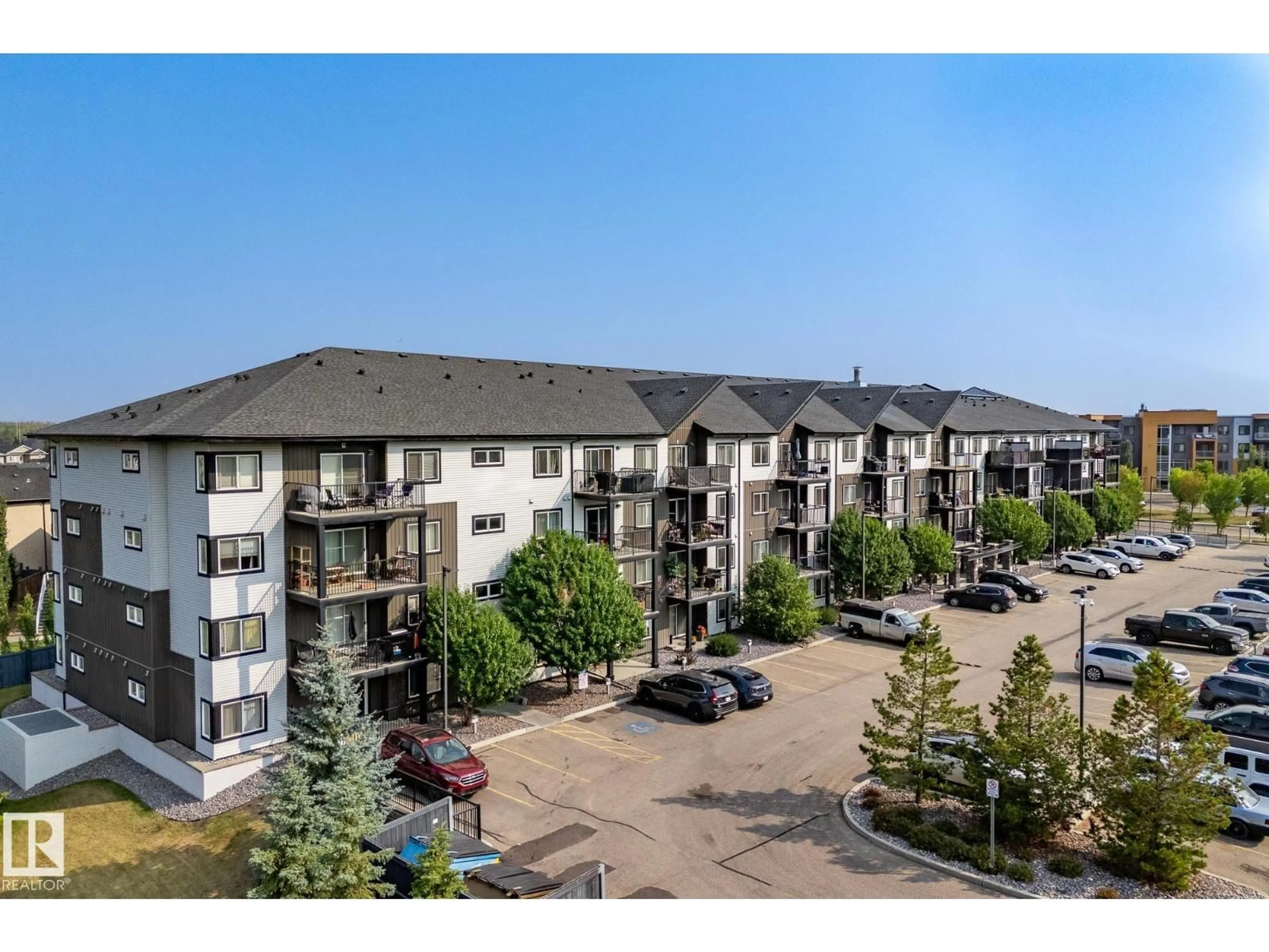 A pic from outside/outdoor area/front of a property/back of a property/a pic from drone, unknown for 508 - 117 ALBANY WY, Edmonton Alberta T6V0L1