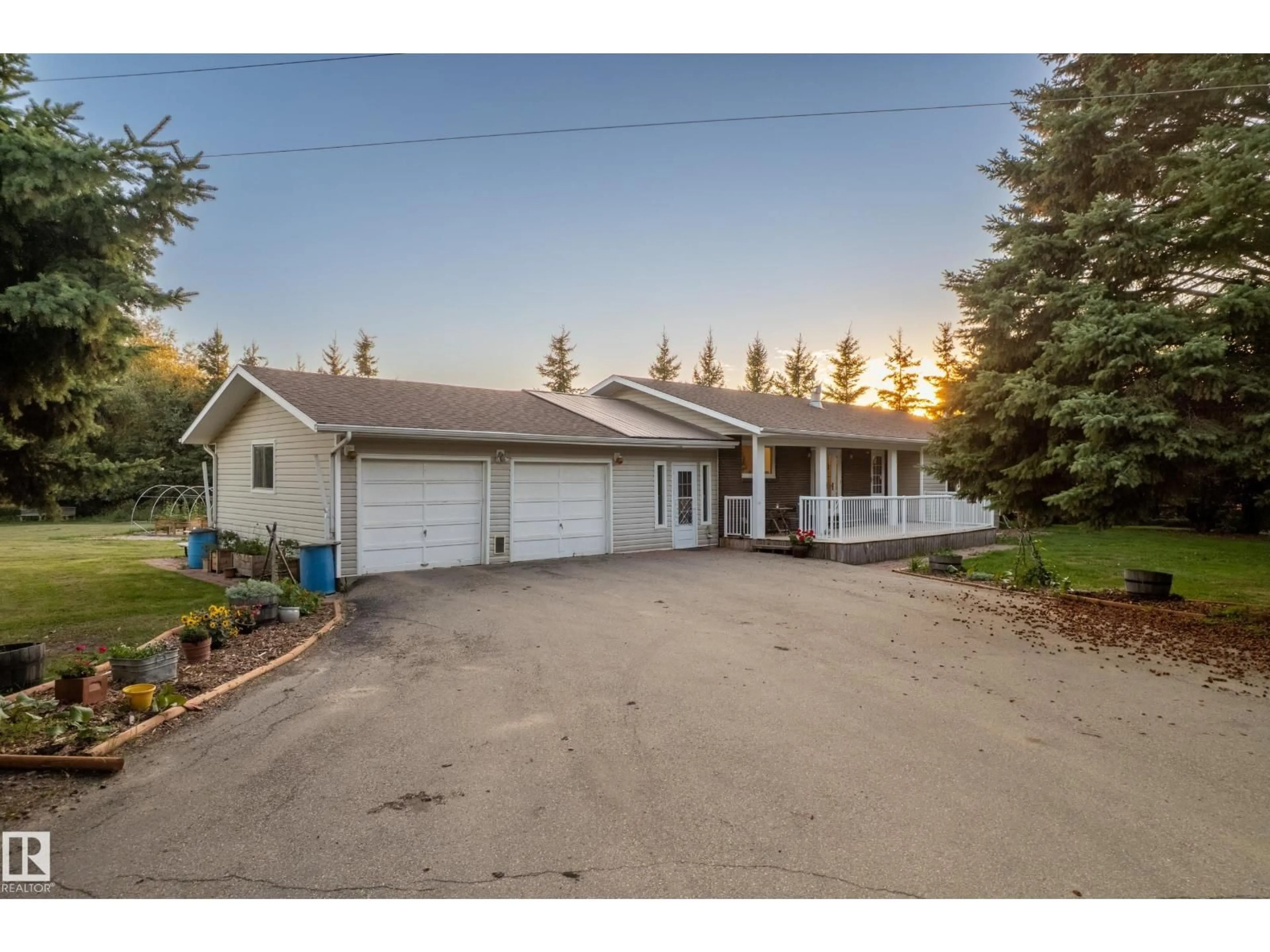 A pic from outside/outdoor area/front of a property/back of a property/a pic from drone, street for 26417 TWP ROAD 594, Rural Westlock County Alberta T7P2P4