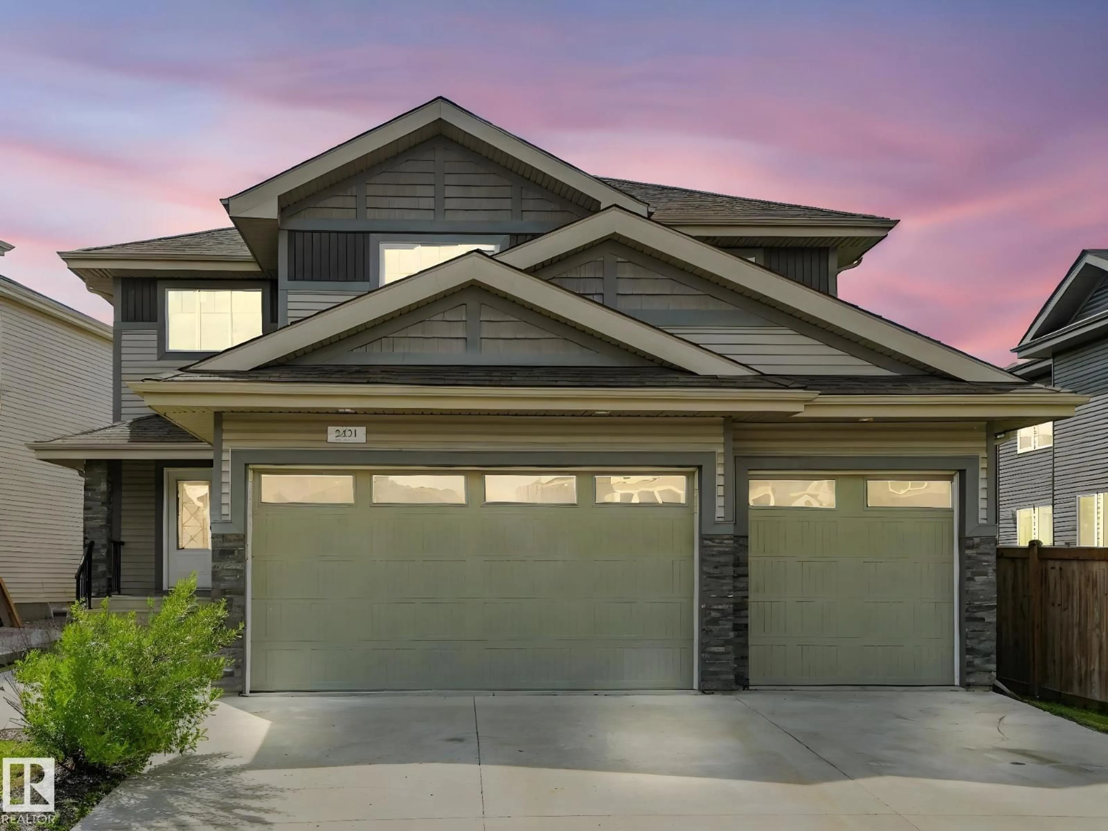 Home with vinyl exterior material, street for 2421 ASHCRAFT CR, Edmonton Alberta T6W2M9