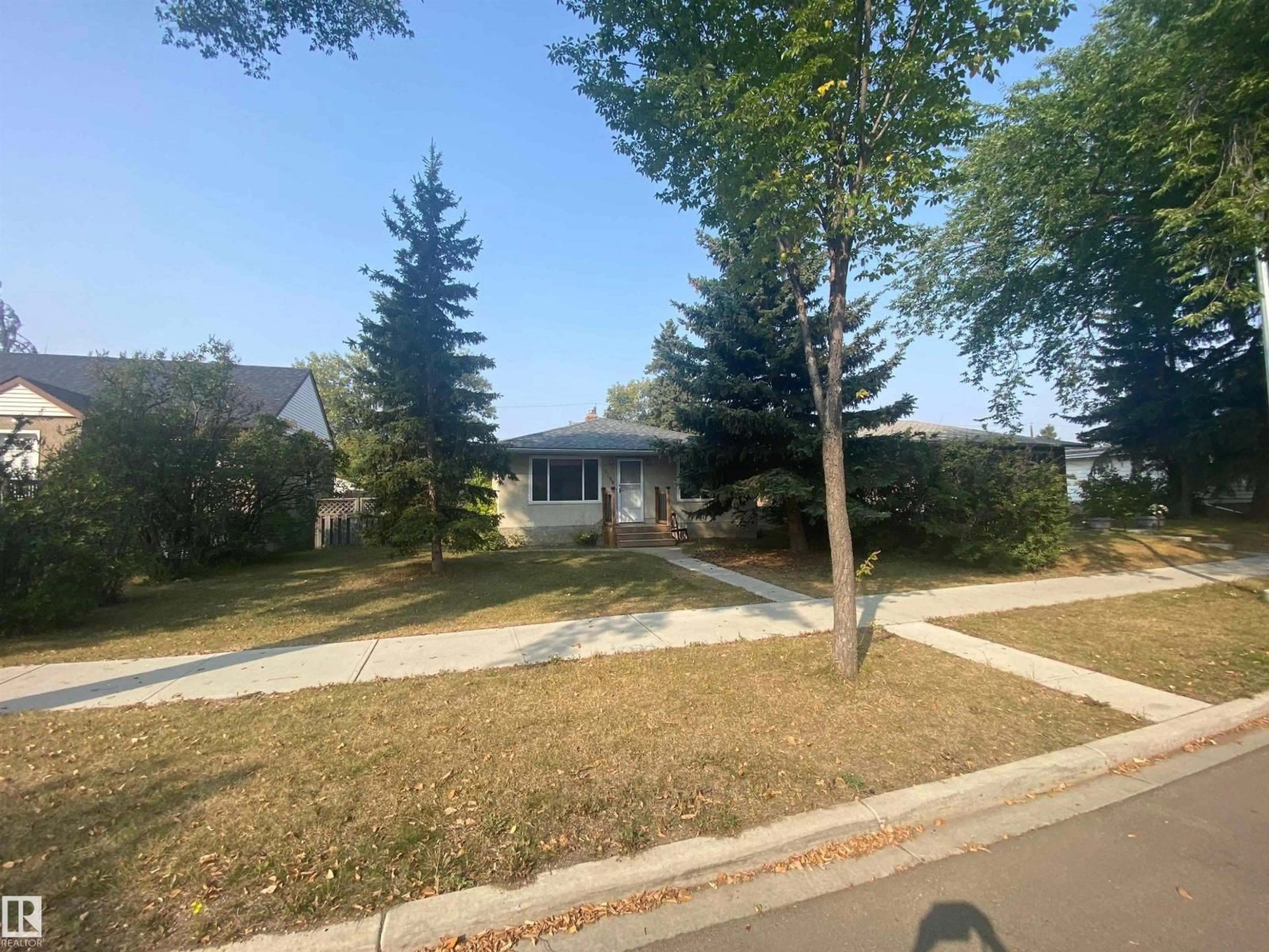 A pic from outside/outdoor area/front of a property/back of a property/a pic from drone, street for 13106 120 ST, Edmonton Alberta T5E5P2