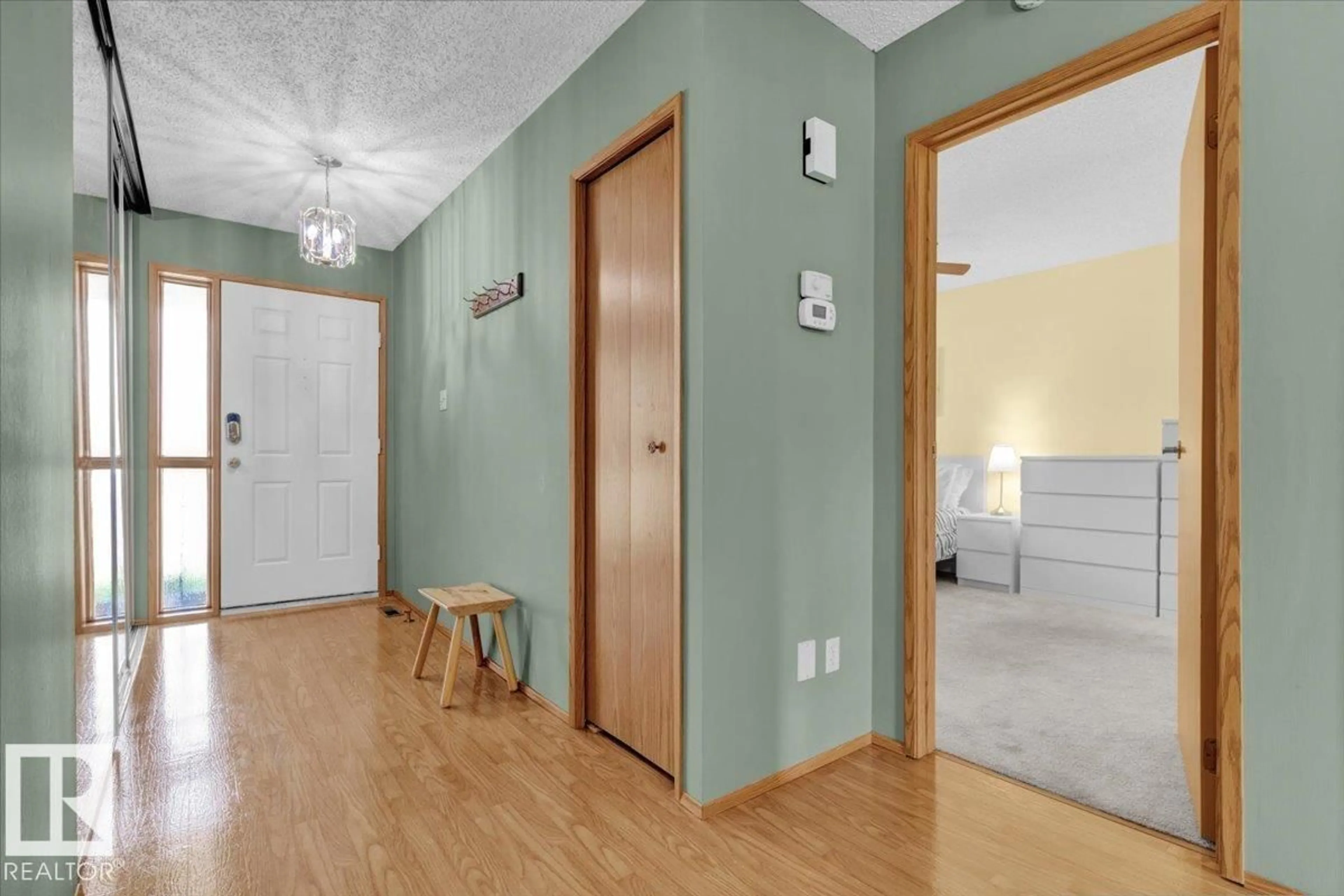 Indoor entryway for 10724 153 AV, Edmonton Alberta T5X5T9
