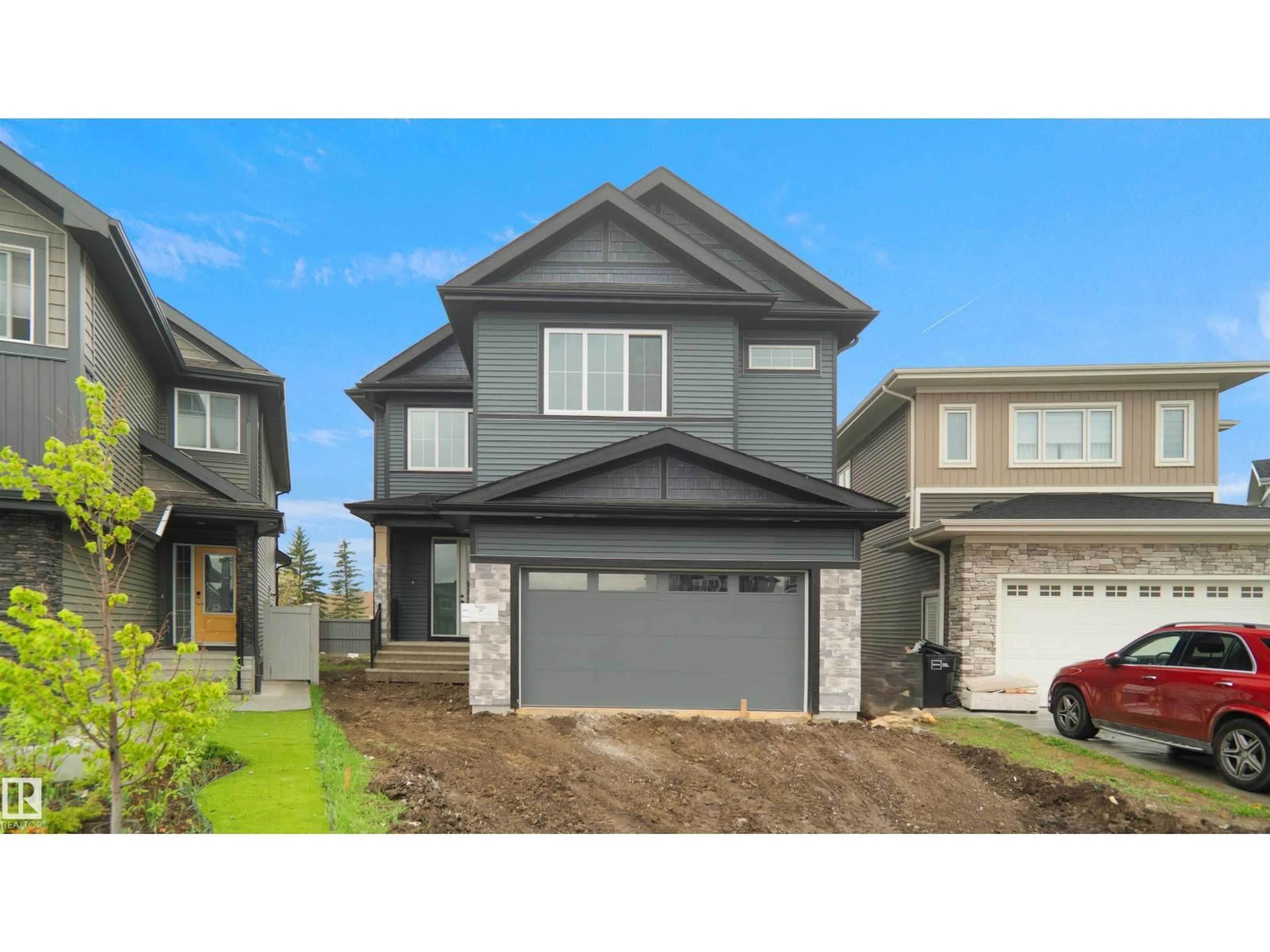 Home with vinyl exterior material, street for 6187 CARR RD, Edmonton Alberta T5E6Y5