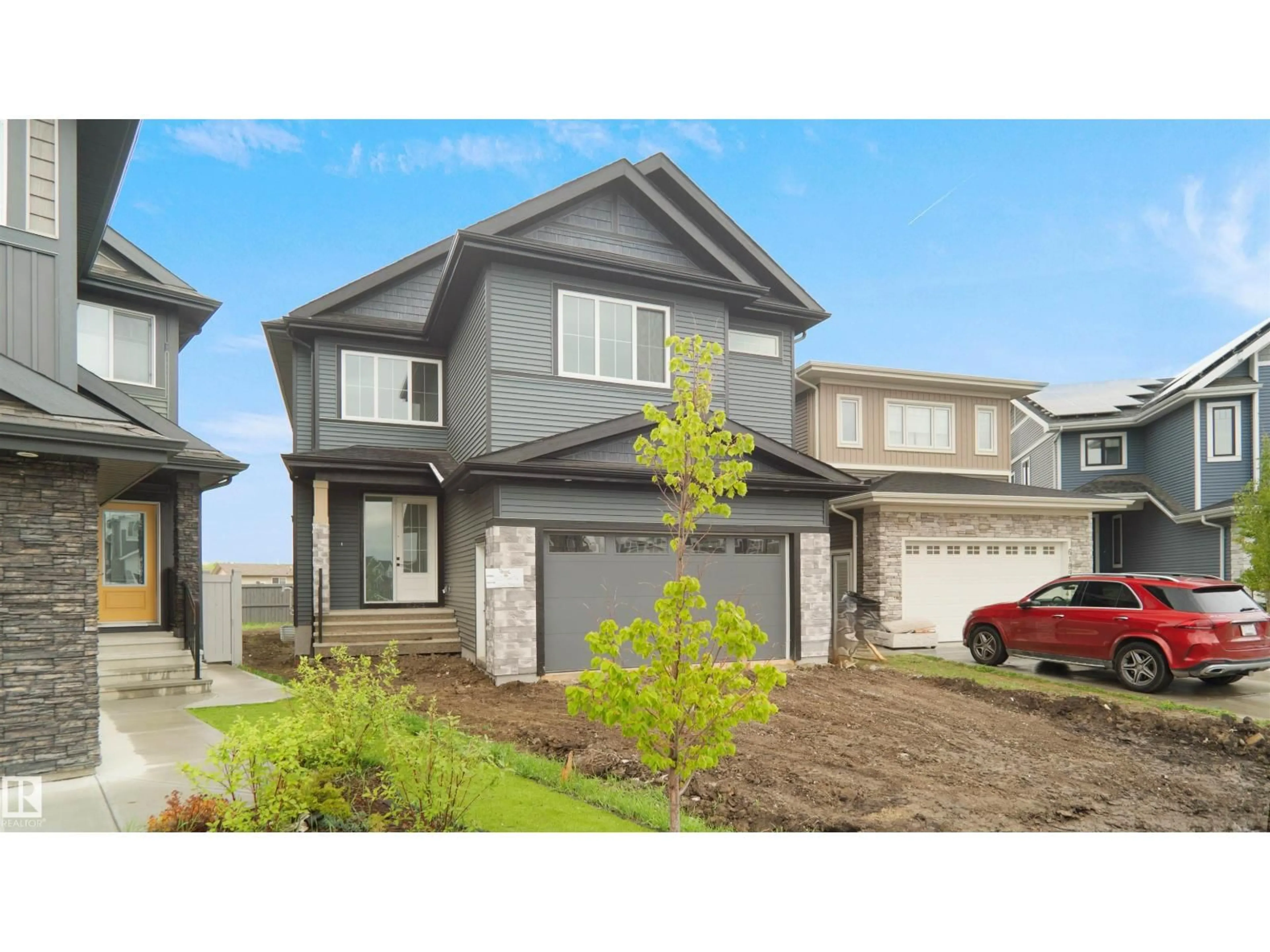 Home with vinyl exterior material, street for 6187 CARR RD, Edmonton Alberta T5E6Y5