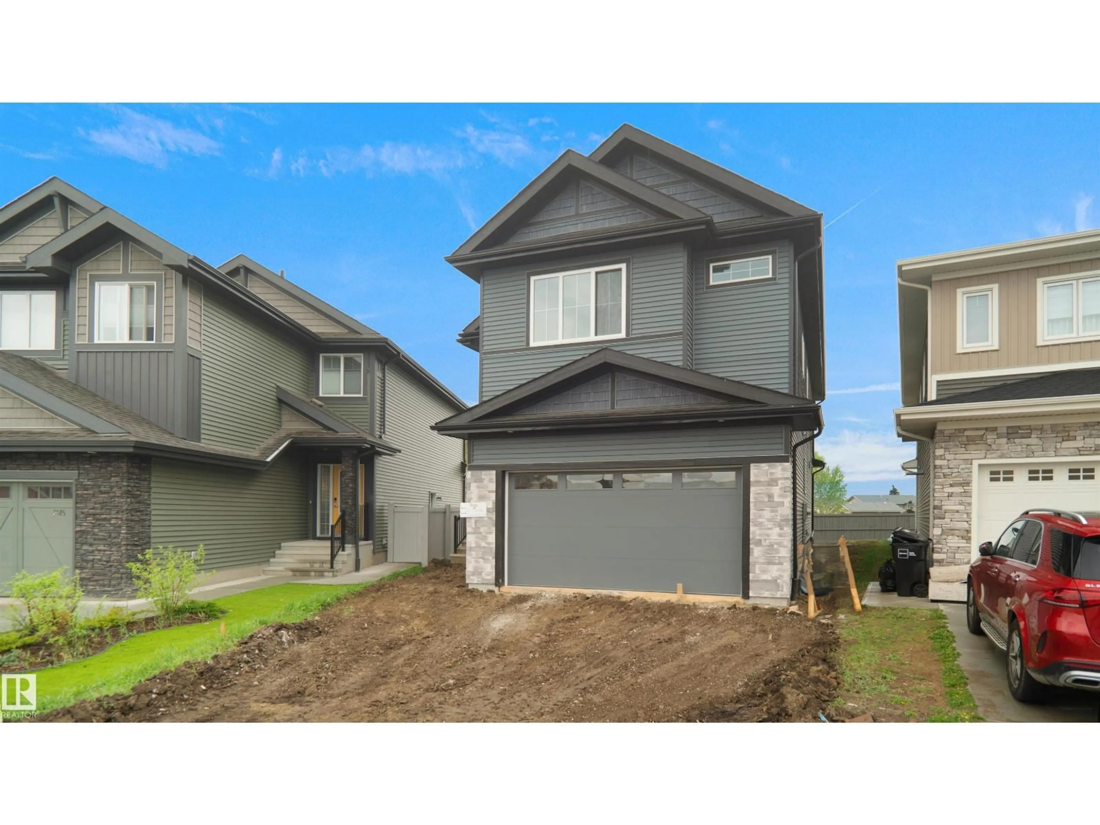 Home with vinyl exterior material, street for 6187 CARR RD, Edmonton Alberta T5E6Y5