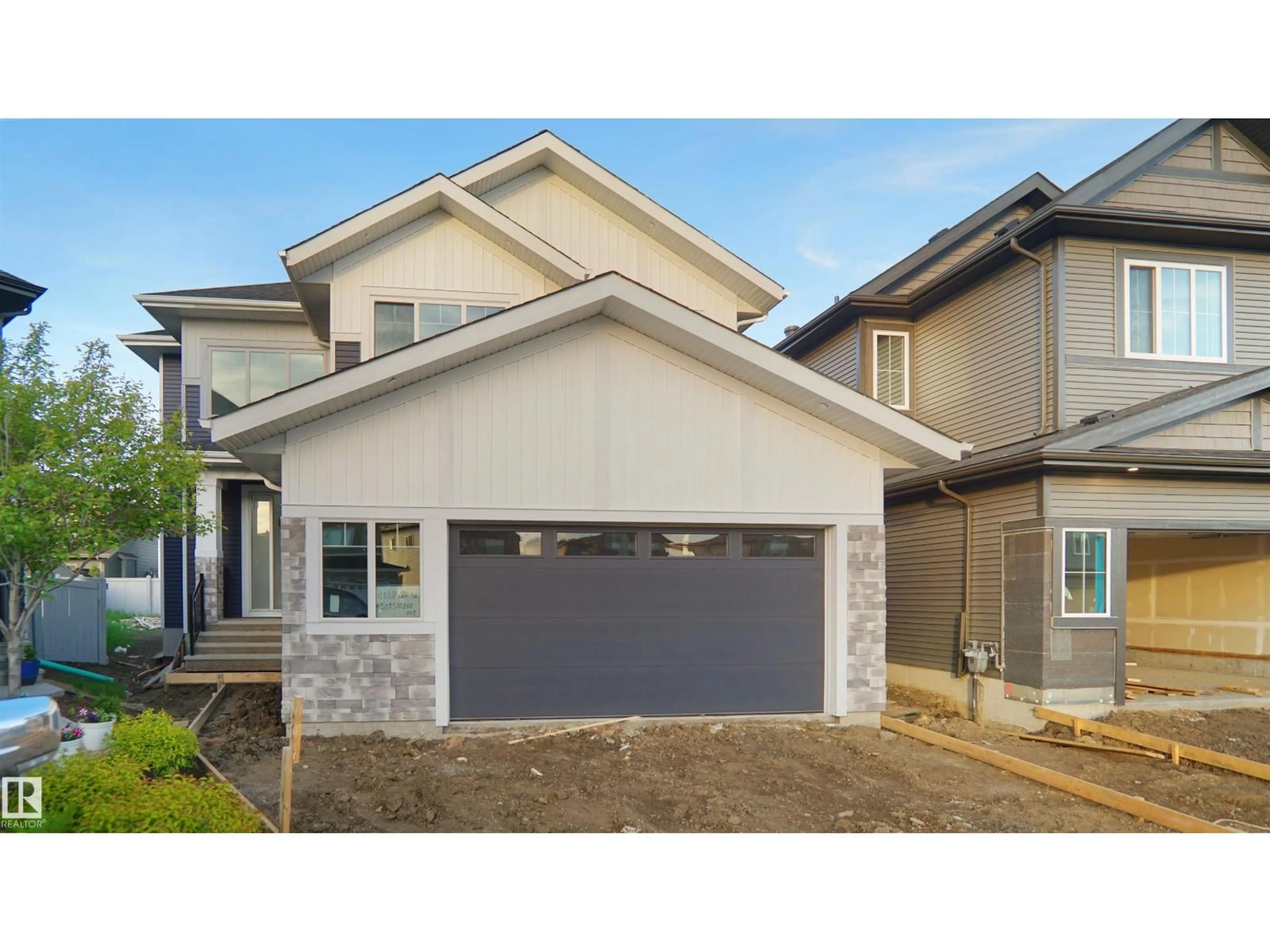 Home with vinyl exterior material, street for 6188 CARR RD, Edmonton Alberta T5E6Y5