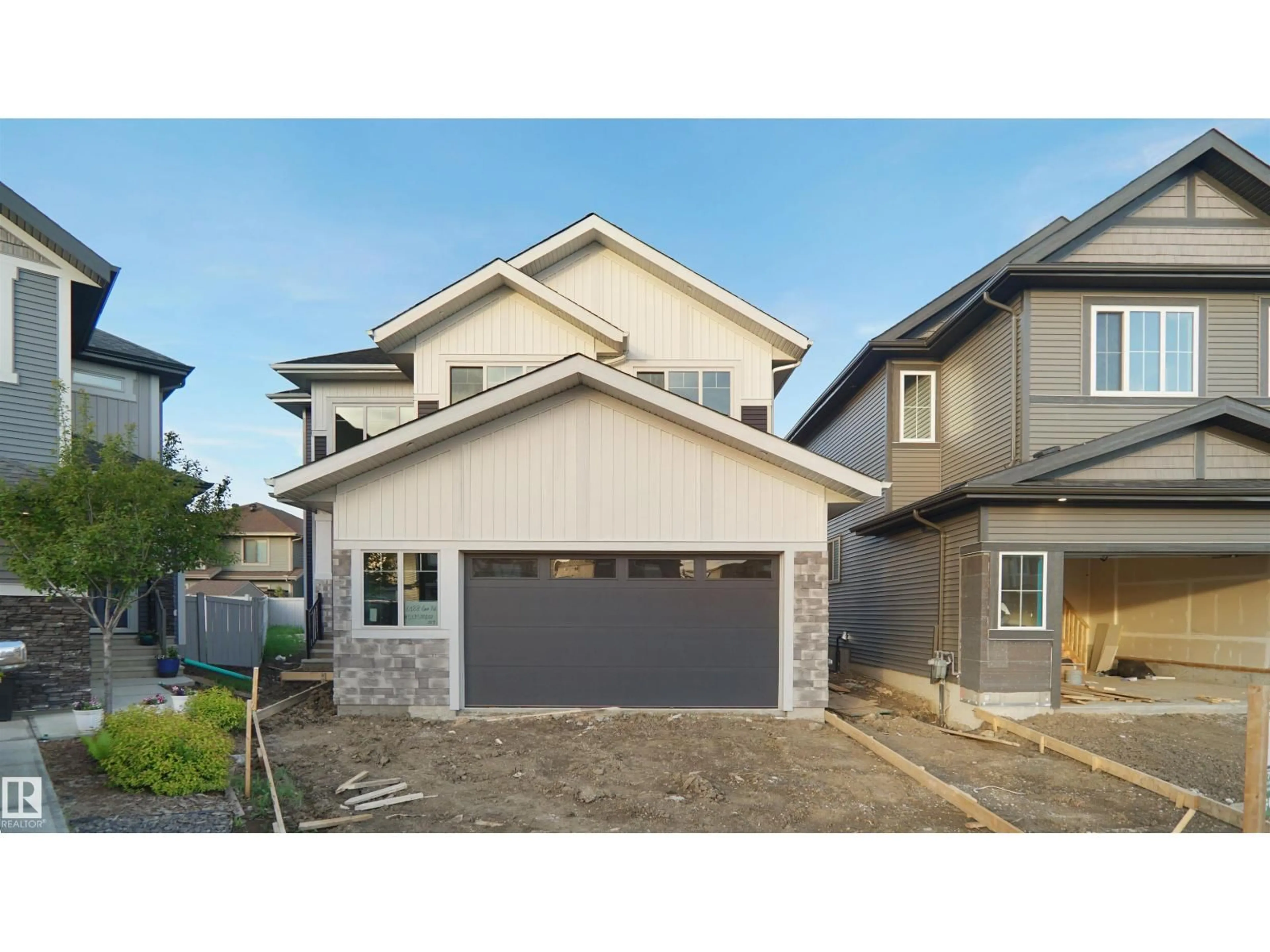 Home with vinyl exterior material, street for 6188 CARR RD, Edmonton Alberta T5E6Y5