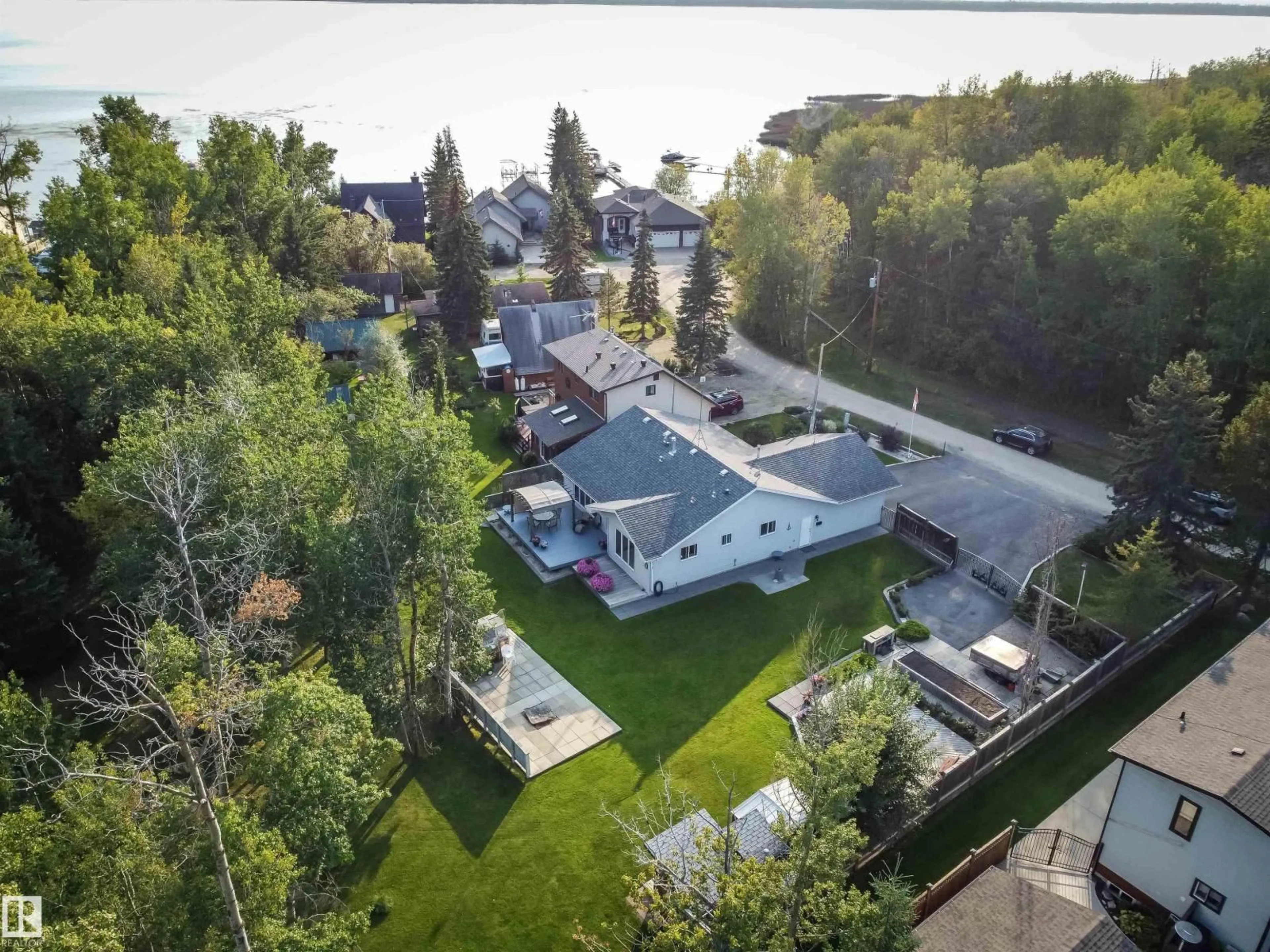A pic from outside/outdoor area/front of a property/back of a property/a pic from drone, street for 1087 10 ST, Rural Lac Ste. Anne County Alberta T0E1A0