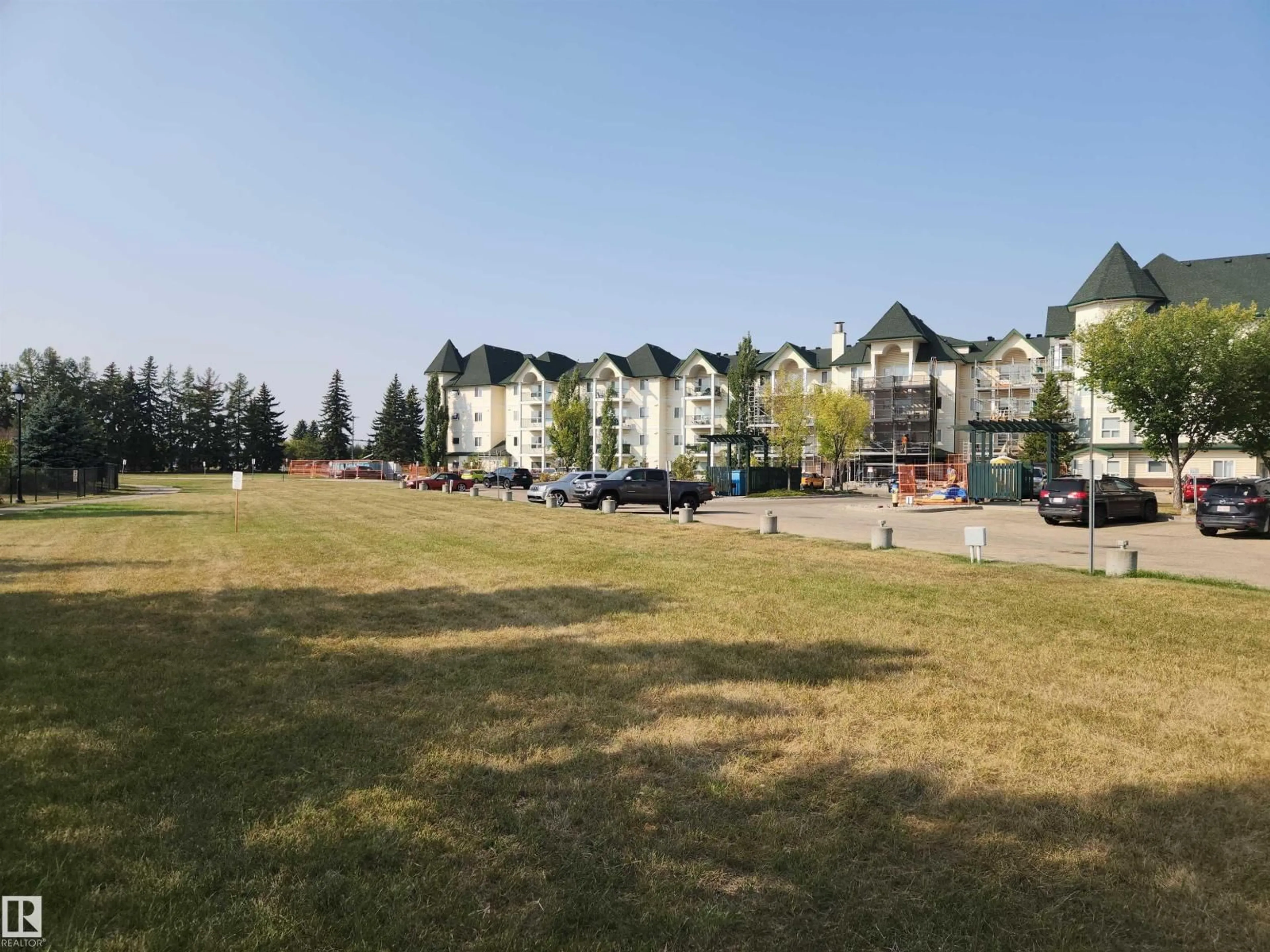 A pic from outside/outdoor area/front of a property/back of a property/a pic from drone, mountain view for #305 - 13635 34 ST, Edmonton Alberta T5A0C4