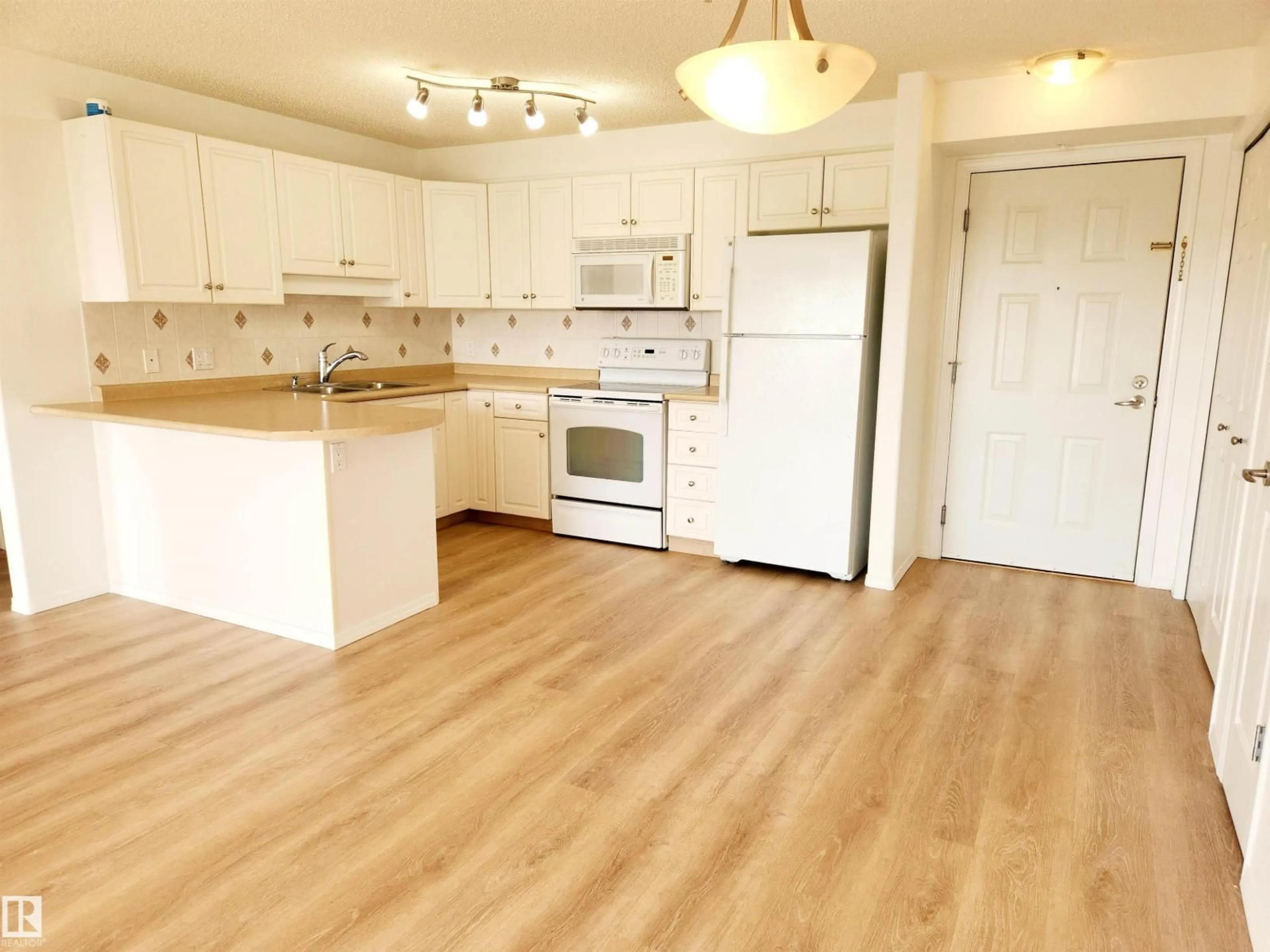 Standard kitchen, wood/laminate floor for #305 - 13635 34 ST, Edmonton Alberta T5A0C4