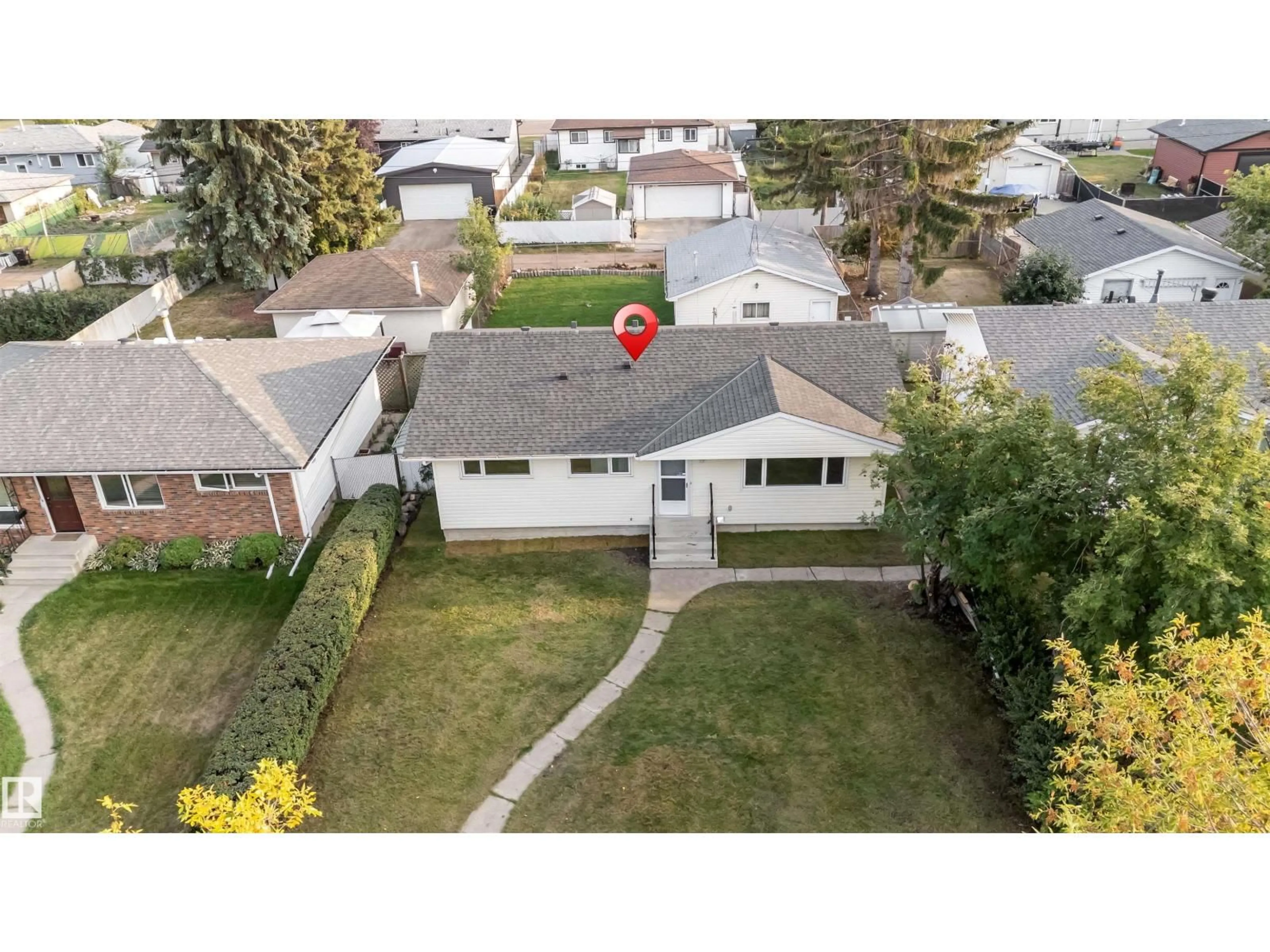 A pic from outside/outdoor area/front of a property/back of a property/a pic from drone, street for 5907 137 AV, Edmonton Alberta T5A0P1