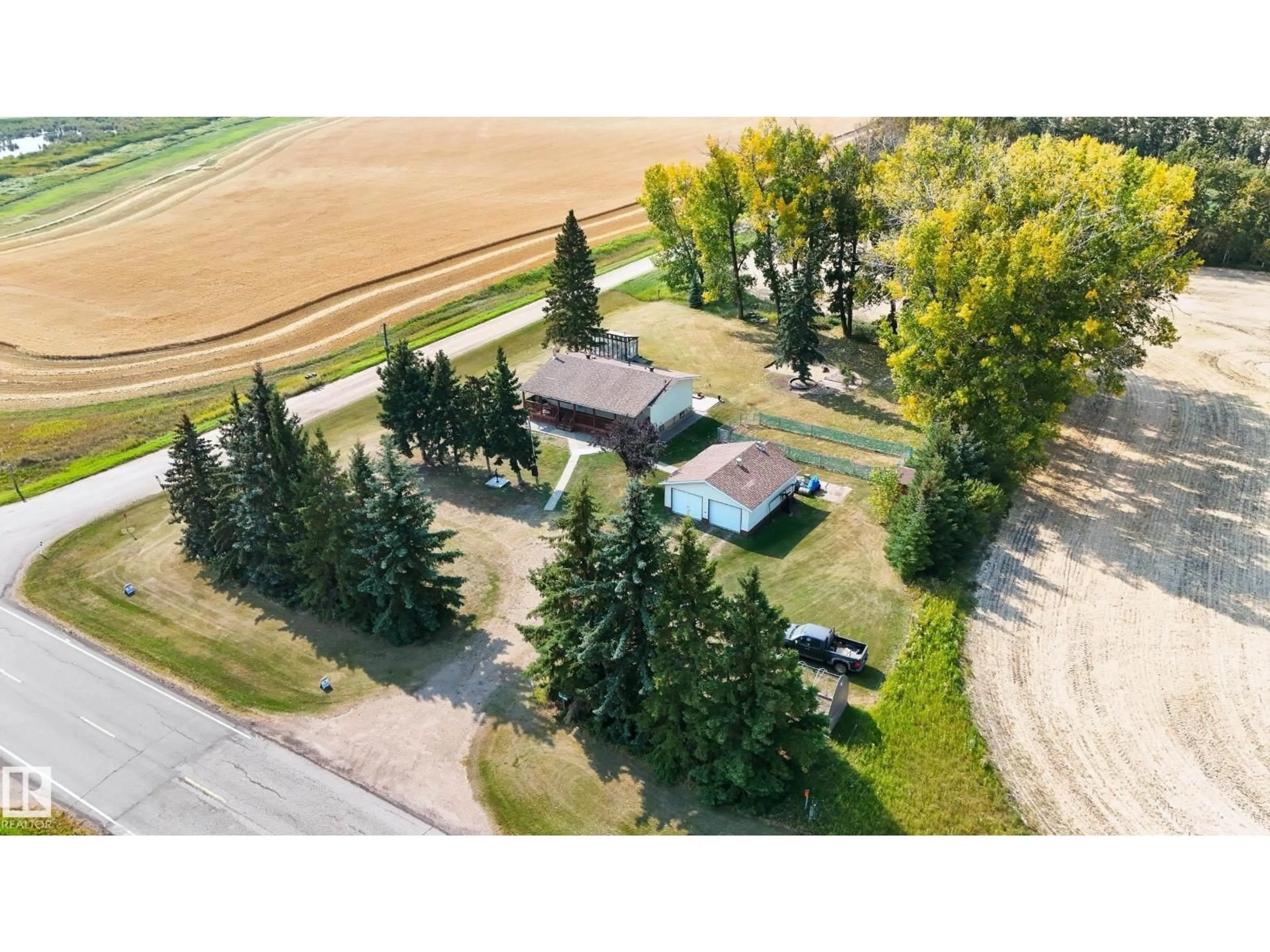 A pic from outside/outdoor area/front of a property/back of a property/a pic from drone, unknown for 441002 HWY 822, Rural Wetaskiwin County Alberta T9A1W9