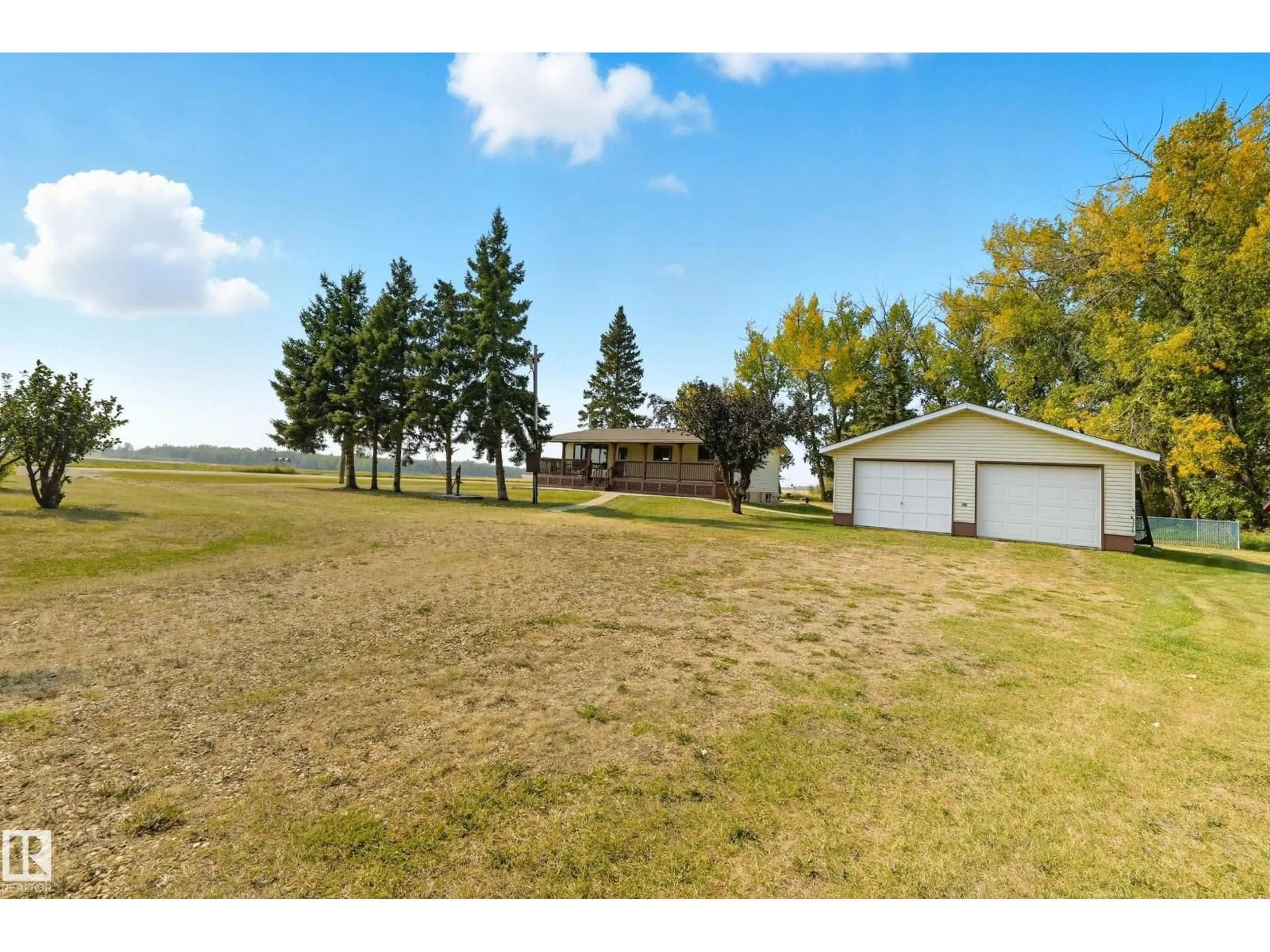 A pic from outside/outdoor area/front of a property/back of a property/a pic from drone, water/lake/river/ocean view for 441002 HWY 822, Rural Wetaskiwin County Alberta T9A1W9