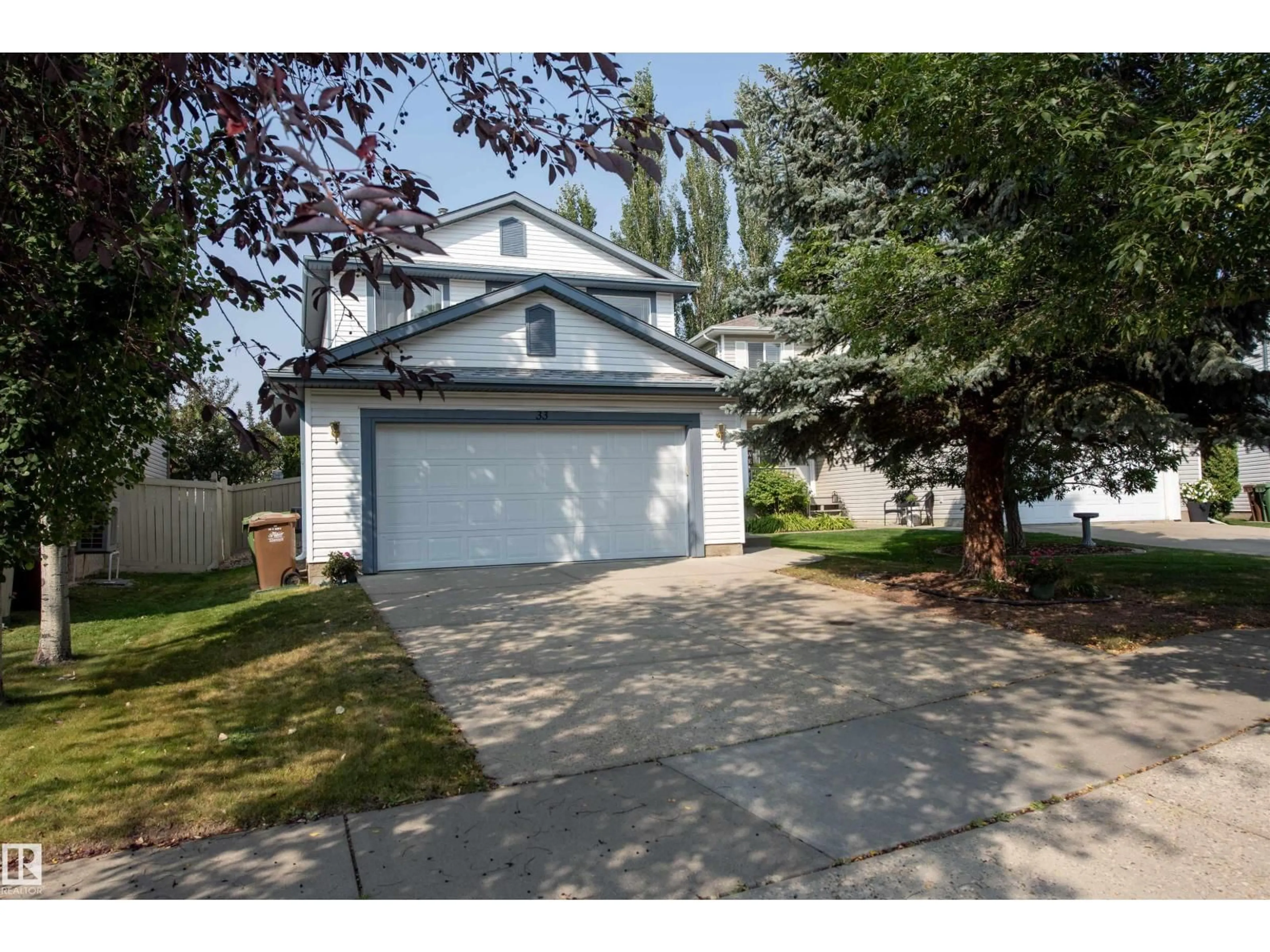 Home with vinyl exterior material, street for 33 EASTCOTT DR, St. Albert Alberta T8N7B1