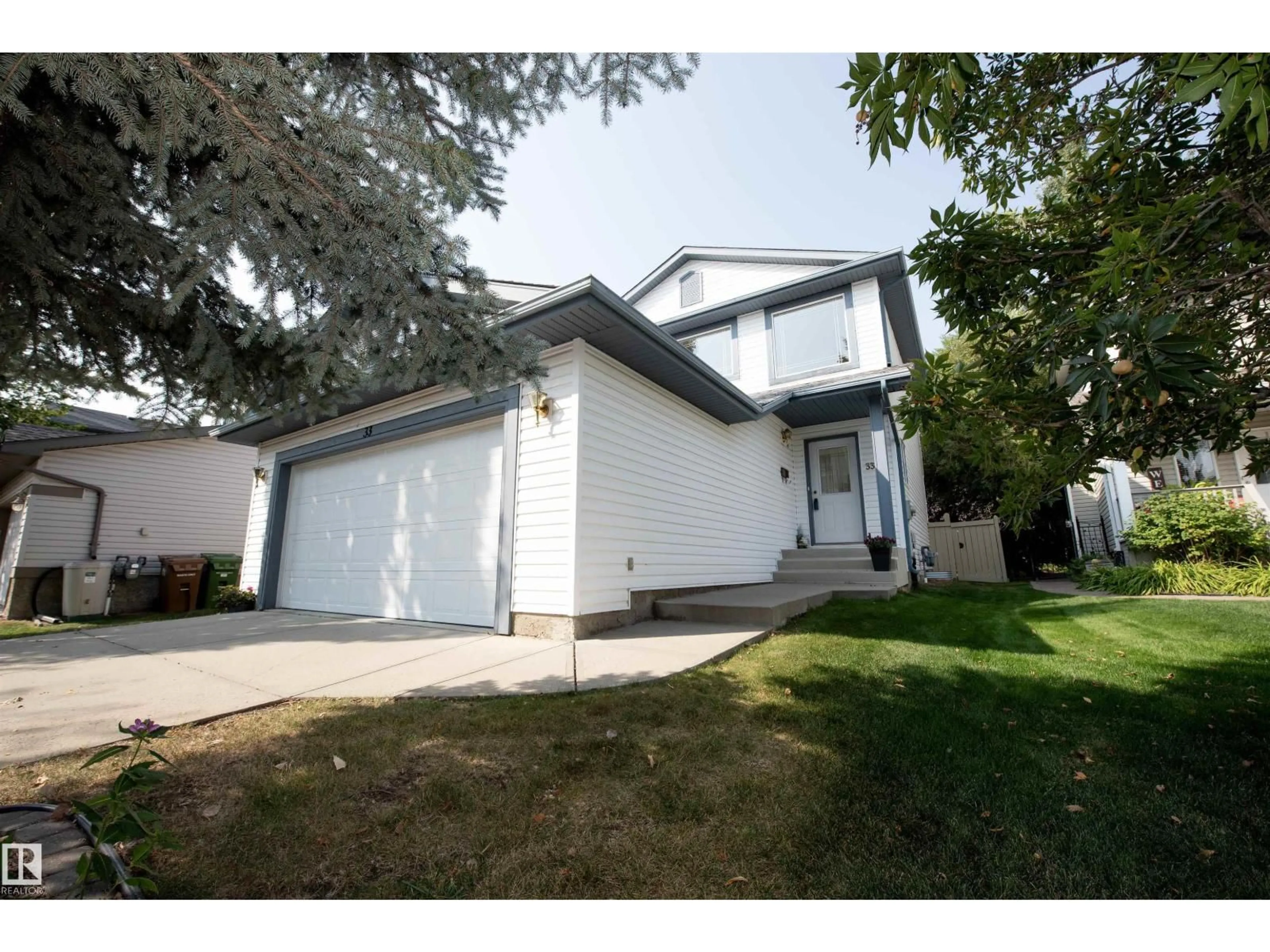 Home with vinyl exterior material, street for 33 EASTCOTT DR, St. Albert Alberta T8N7B1