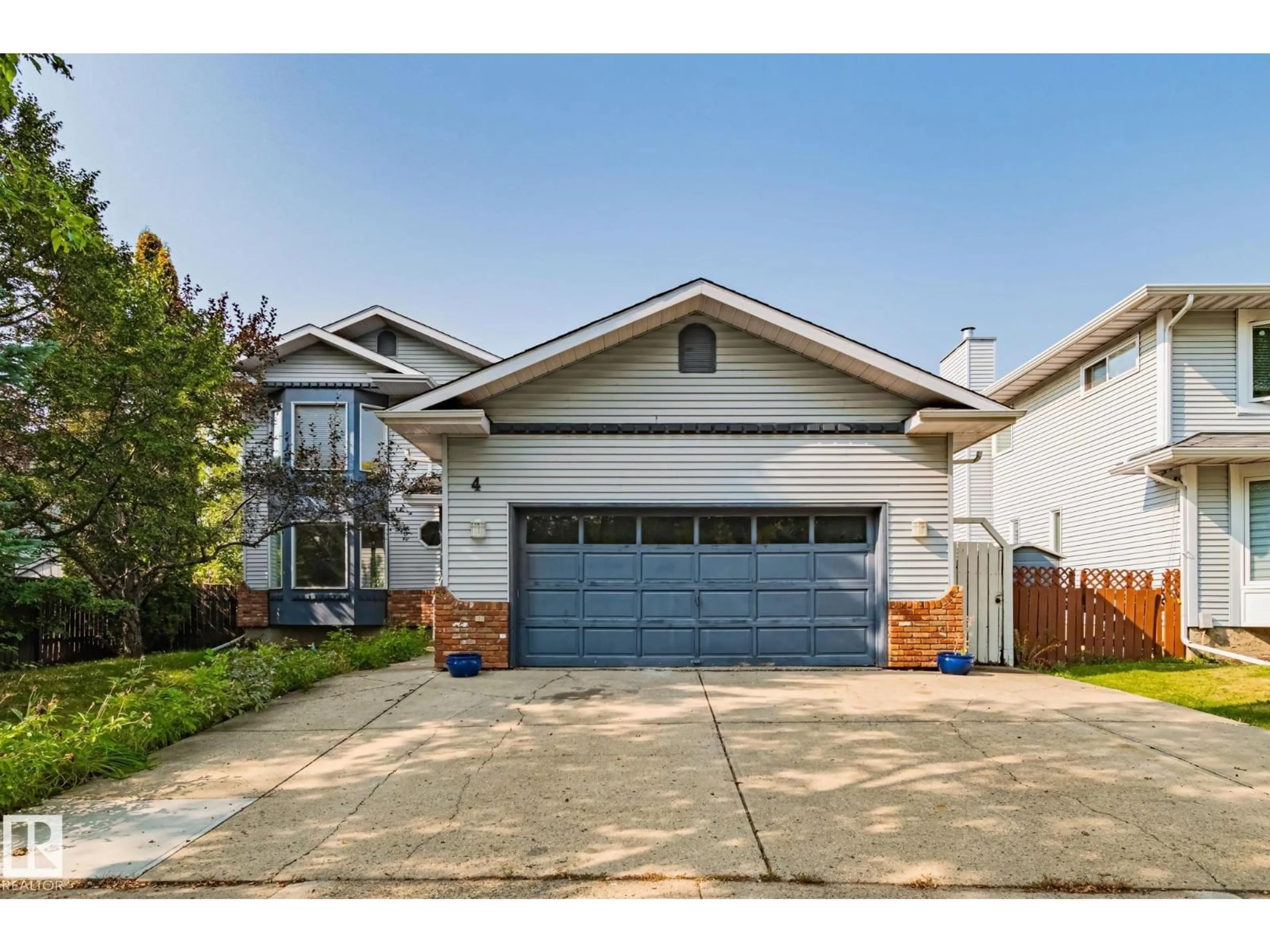 Home with vinyl exterior material, street for 4 LEXINGTON DR, St. Albert Alberta T8N4M6