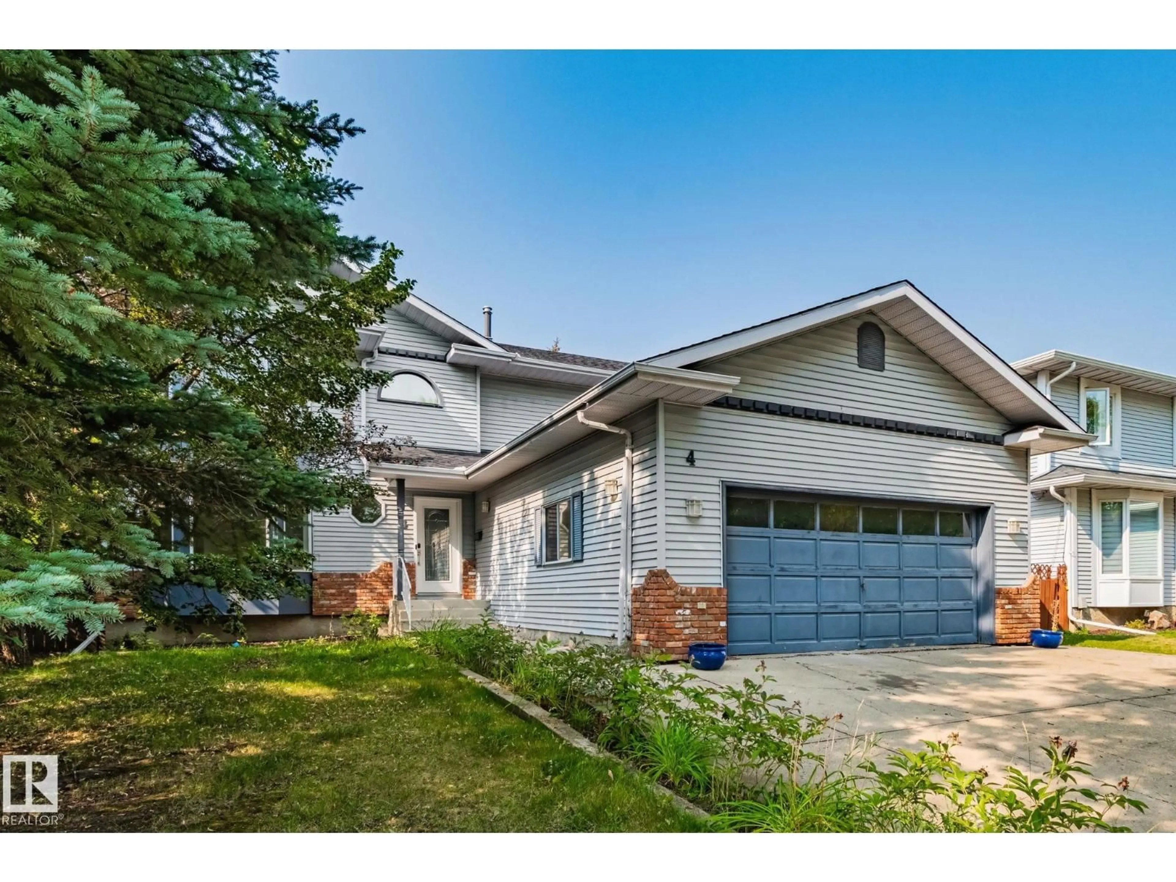Home with vinyl exterior material, street for 4 LEXINGTON DR, St. Albert Alberta T8N4M6