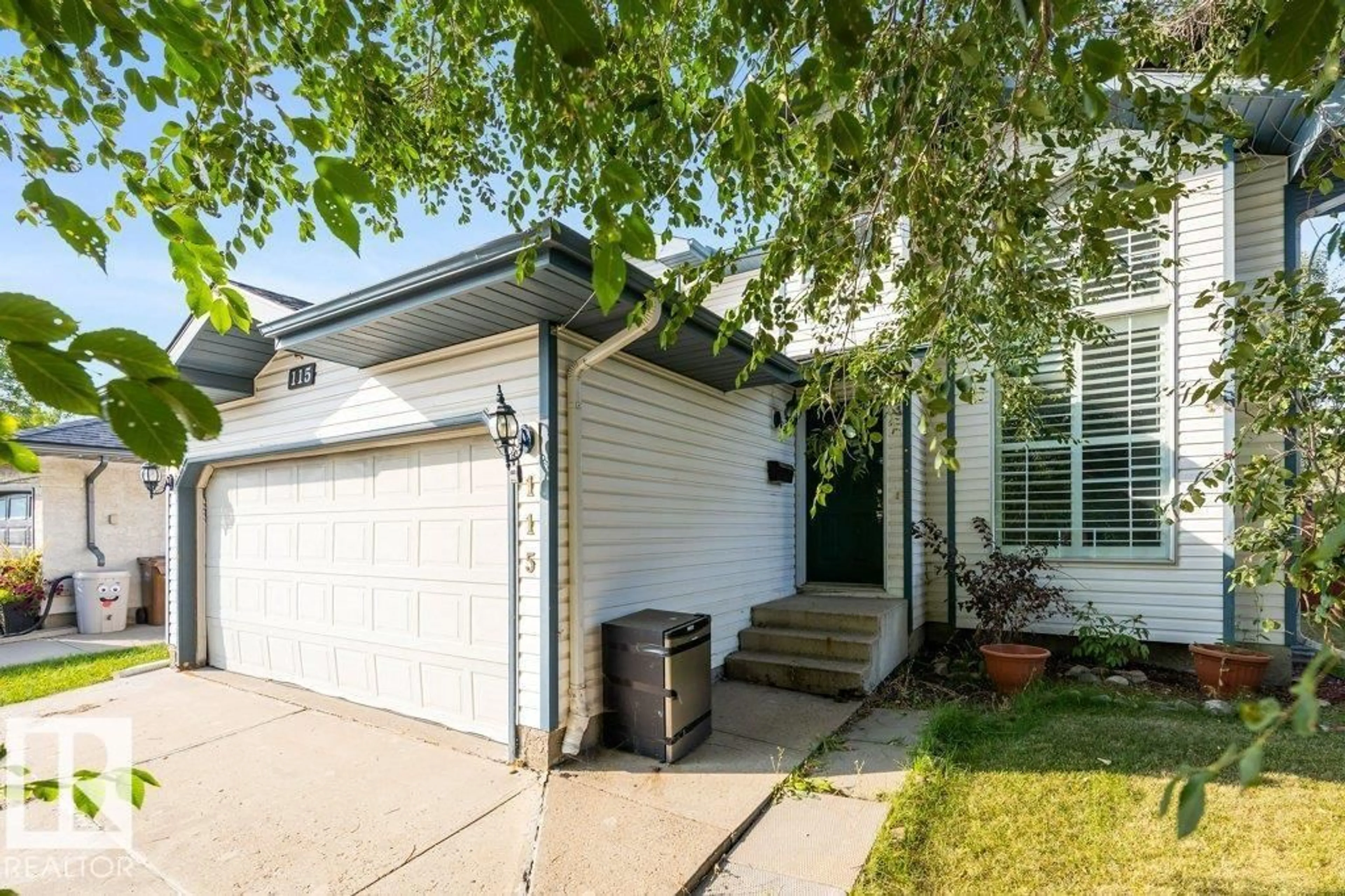 Home with vinyl exterior material, street for 115 DEER RIDGE DR, St. Albert Alberta T8N6G6