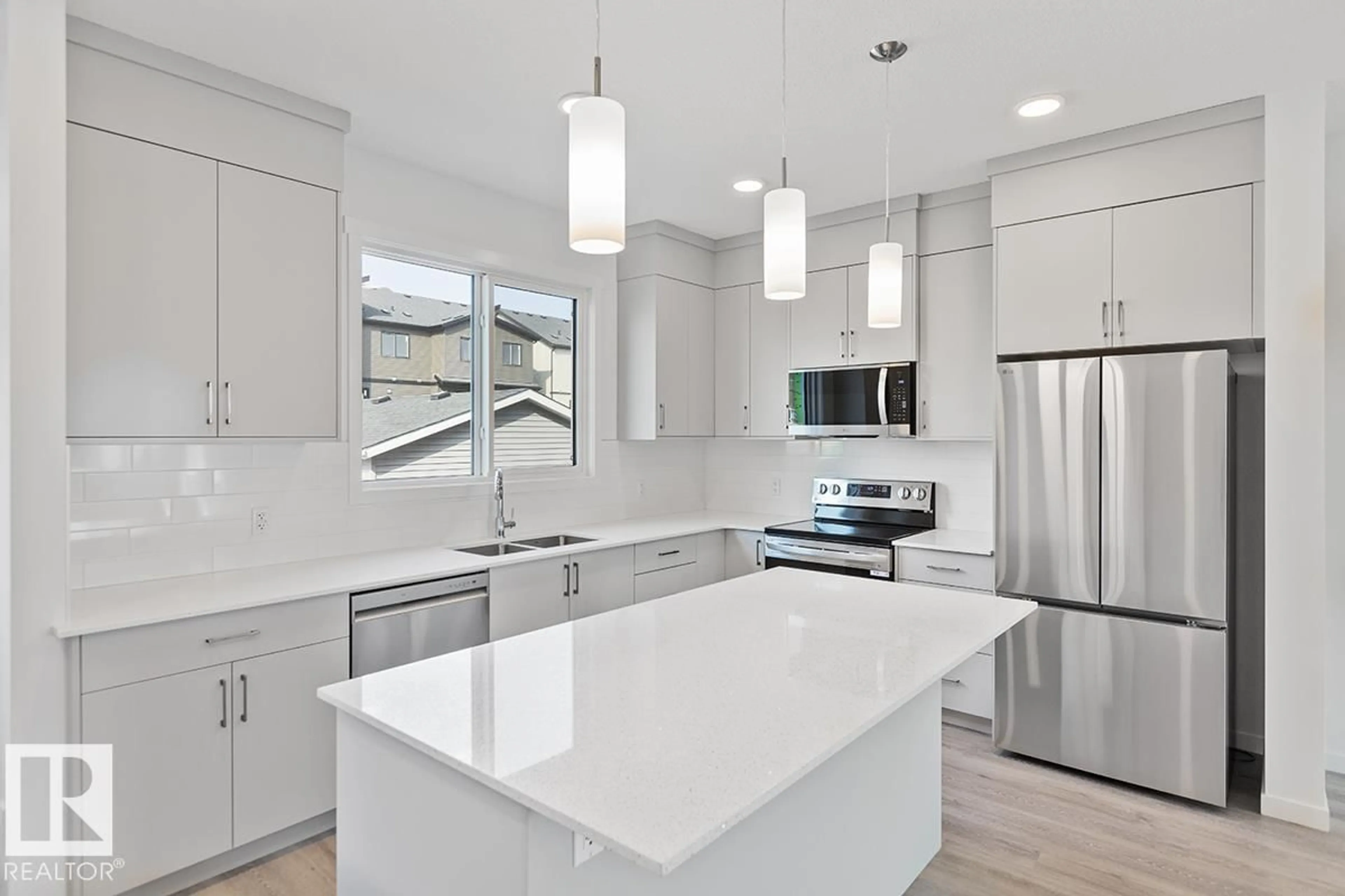 Open concept kitchen, ceramic/tile floor for 3975 WREN LO, Edmonton Alberta T5S0S9