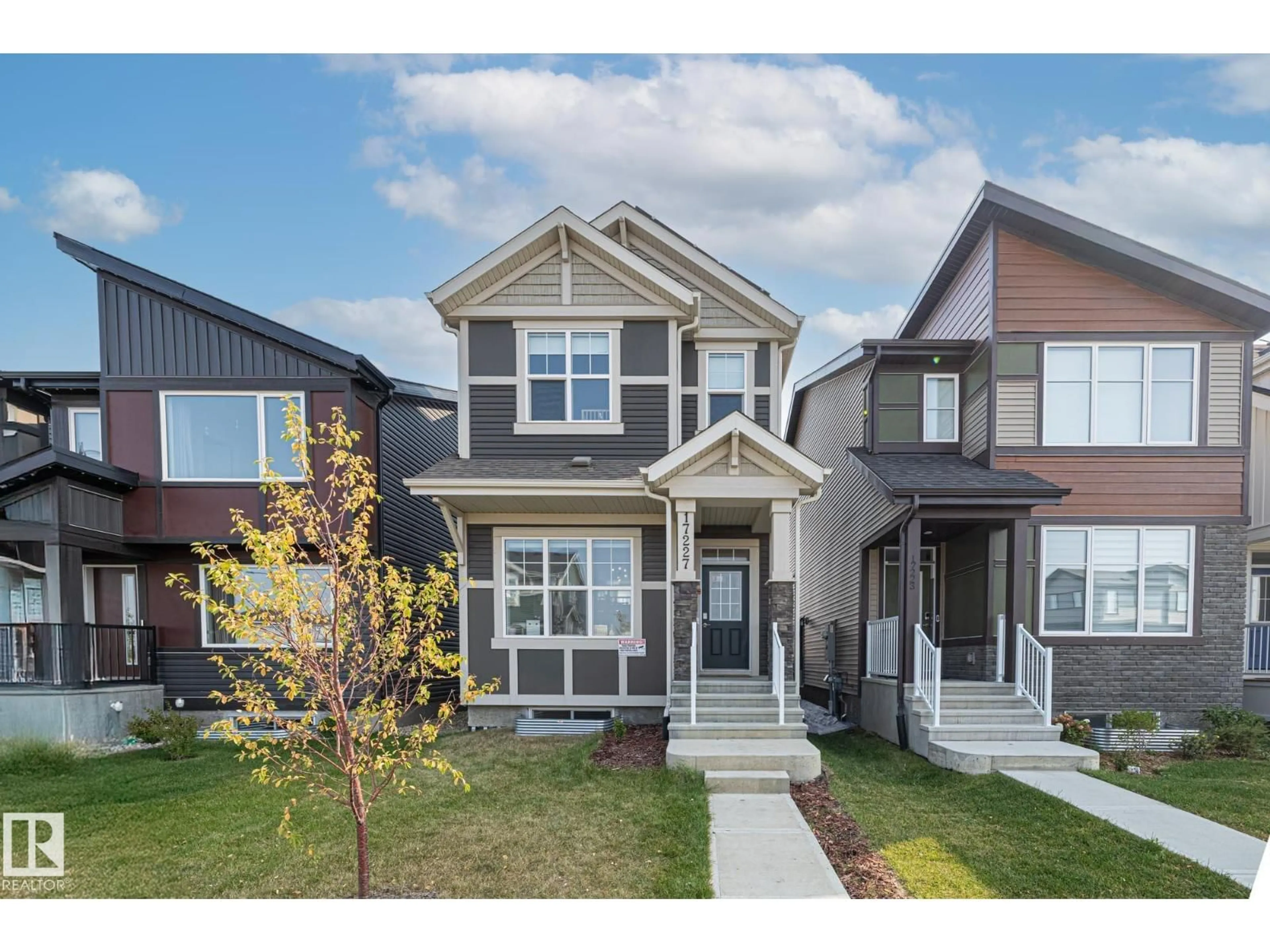 Home with vinyl exterior material, street for 17227 3 ST, Edmonton Alberta T5Y6G4