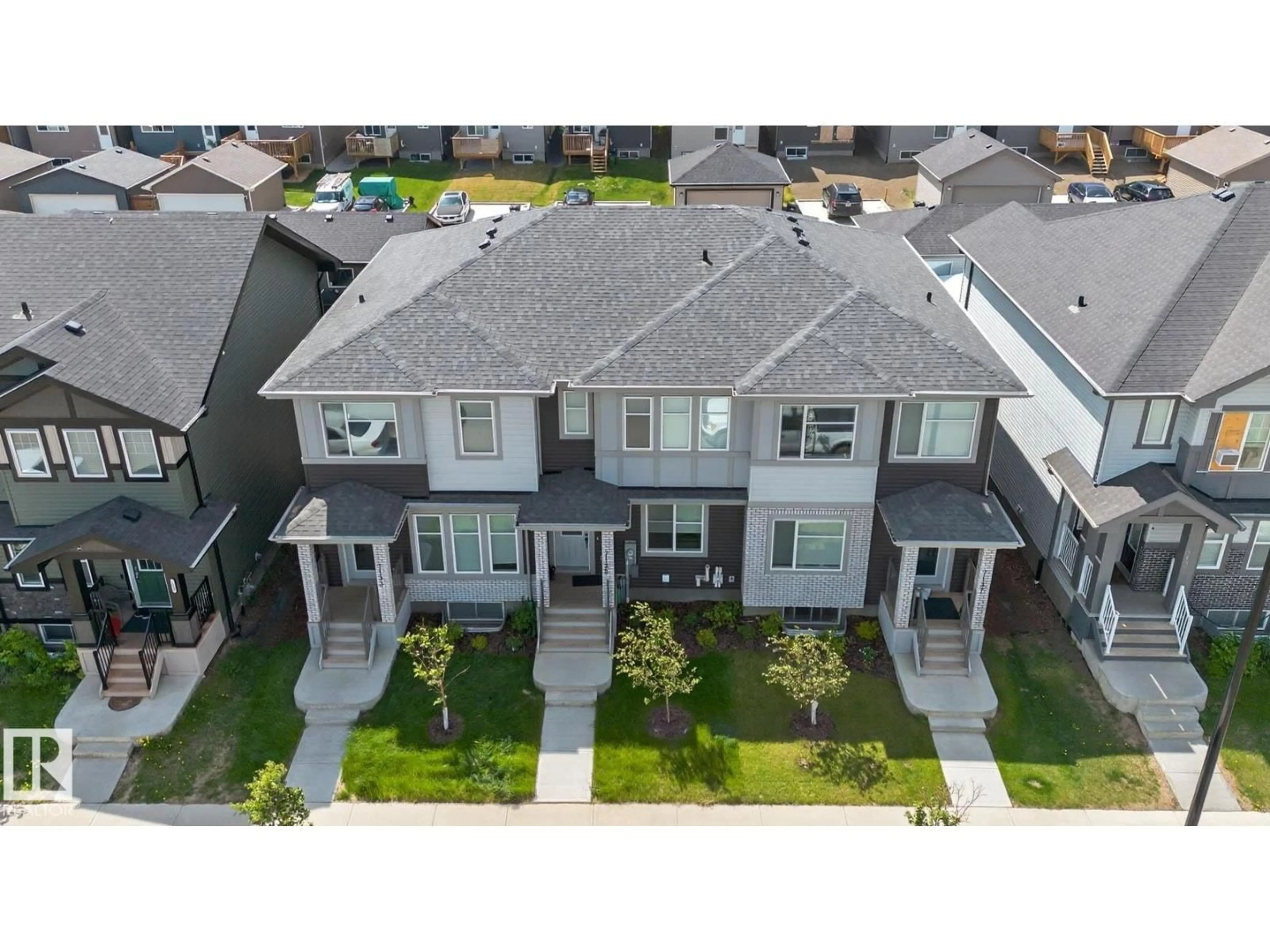A pic from outside/outdoor area/front of a property/back of a property/a pic from drone, street for NW - 7133/35/37 178 AV, Edmonton Alberta T5Z0T8