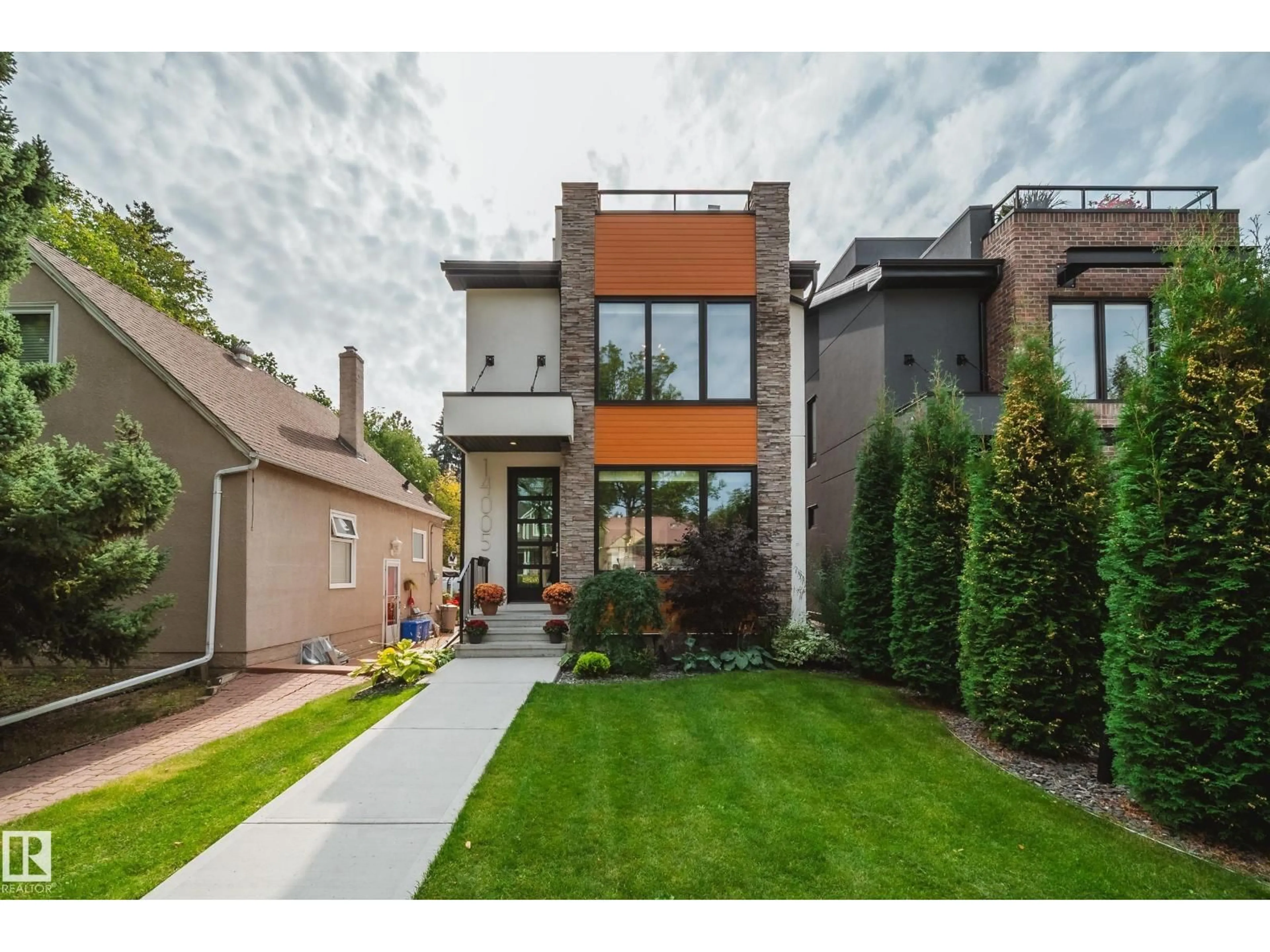 Home with brick exterior material, street for 14005 105 AV, Edmonton Alberta T5N0Z1