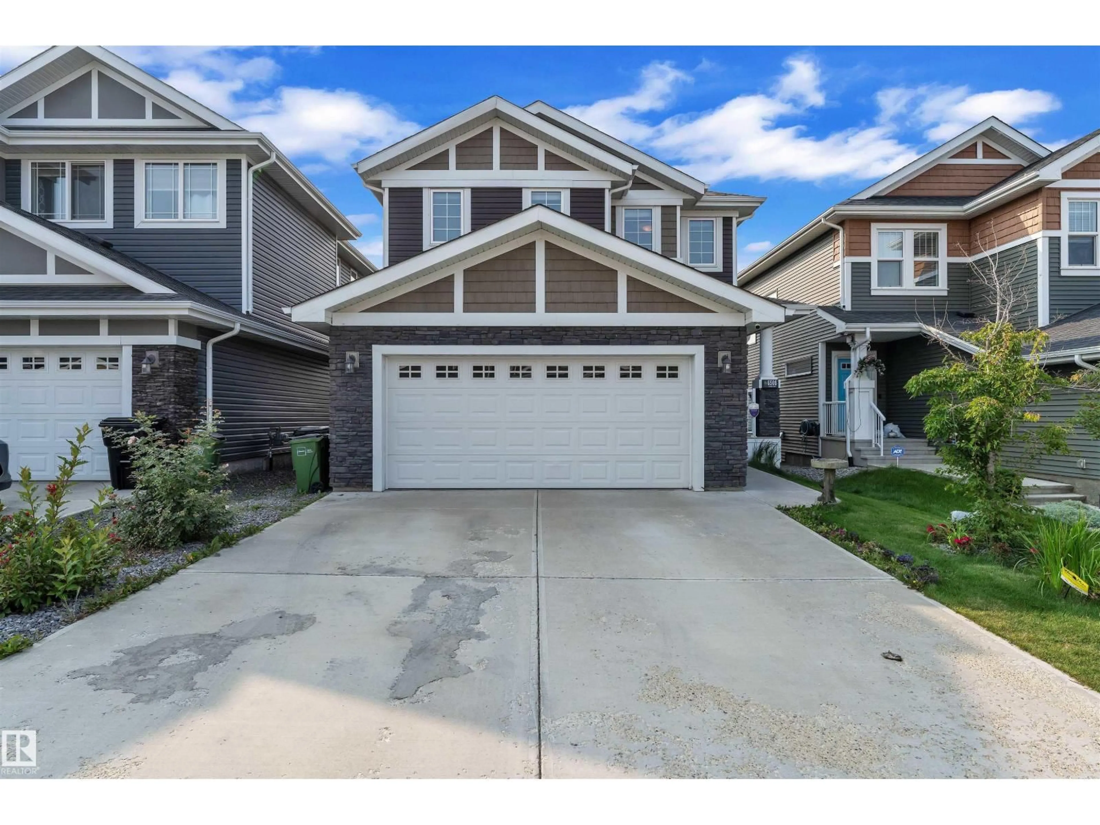 Home with vinyl exterior material, street for NW - 6508 ELSTON LO, Edmonton Alberta T6M0V9
