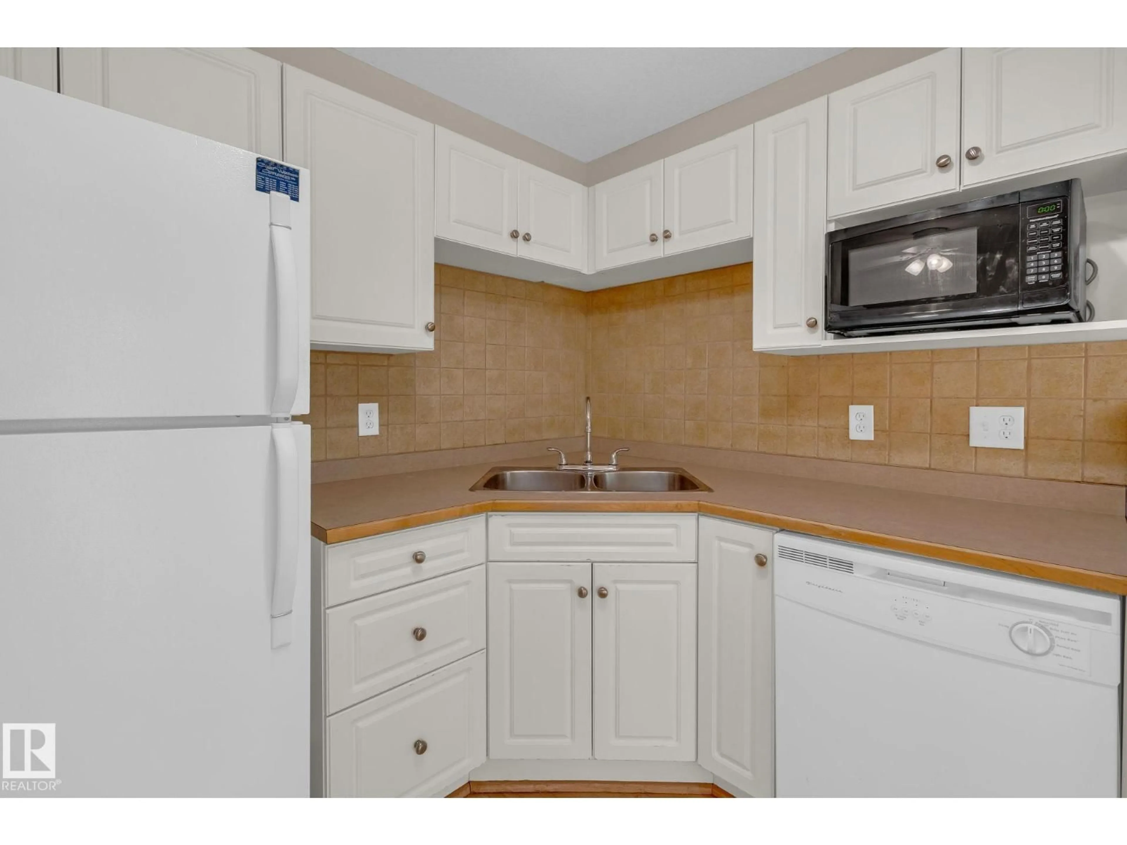 Standard kitchen, unknown for #212 - 12550 140 AV, Edmonton Alberta T5X6J4
