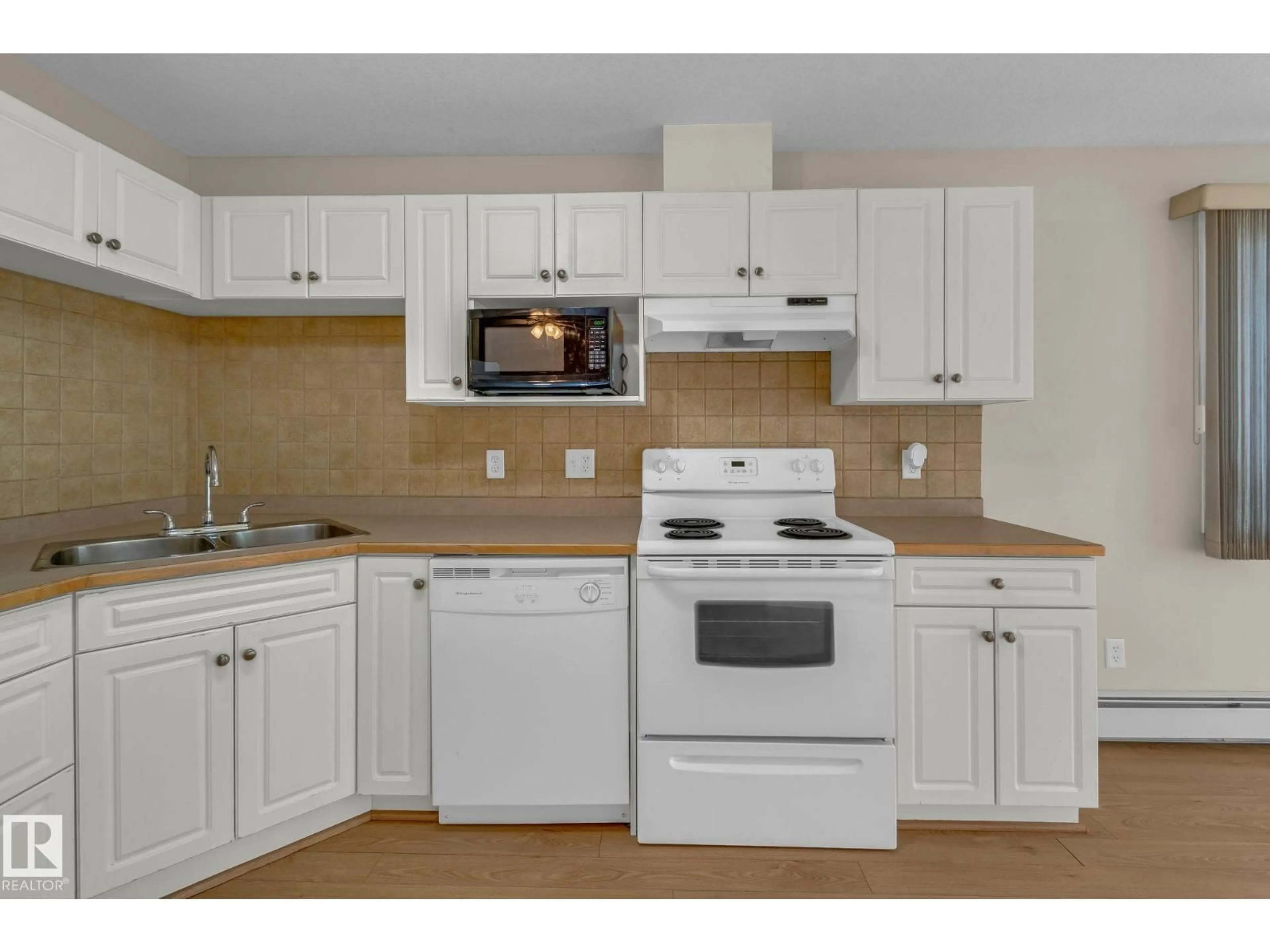Standard kitchen, unknown for #212 - 12550 140 AV, Edmonton Alberta T5X6J4