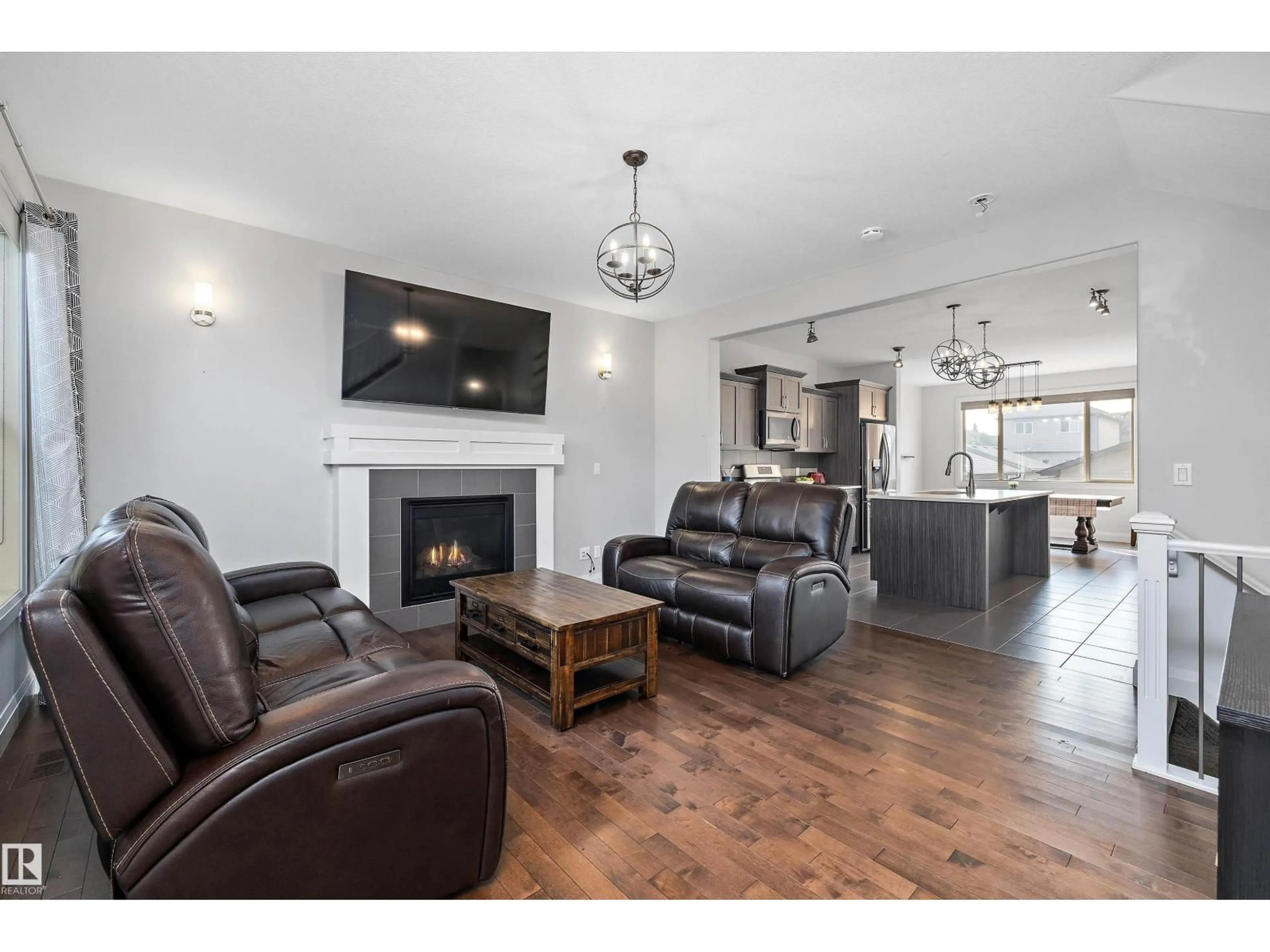 Living room with furniture, wood/laminate floor for 84 GREENBURY BV, Spruce Grove Alberta T7X0M4
