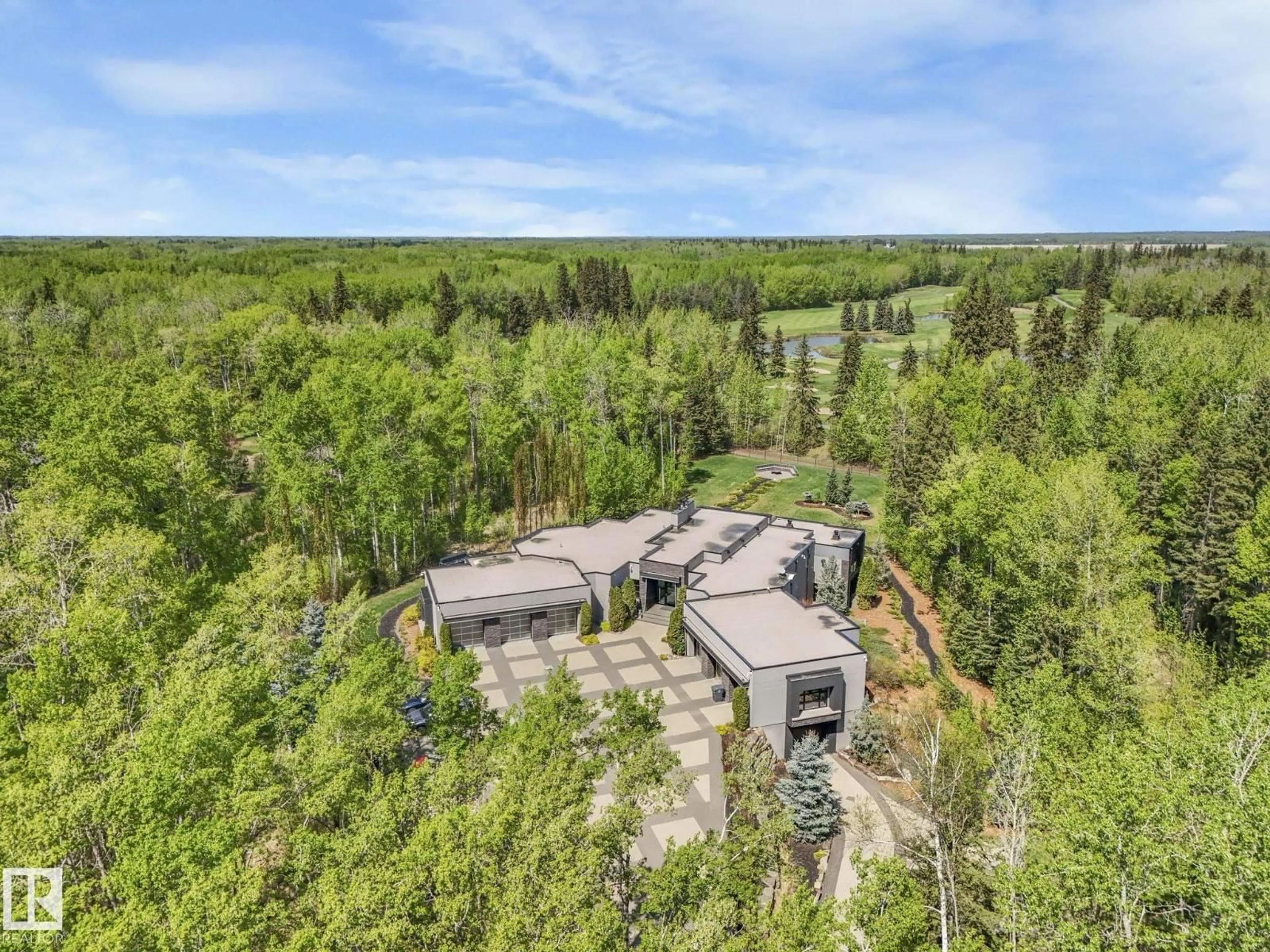 A pic from outside/outdoor area/front of a property/back of a property/a pic from drone, forest/trees view for 51222 RGE ROAD 260, Rural Parkland County Alberta T7Y1B1