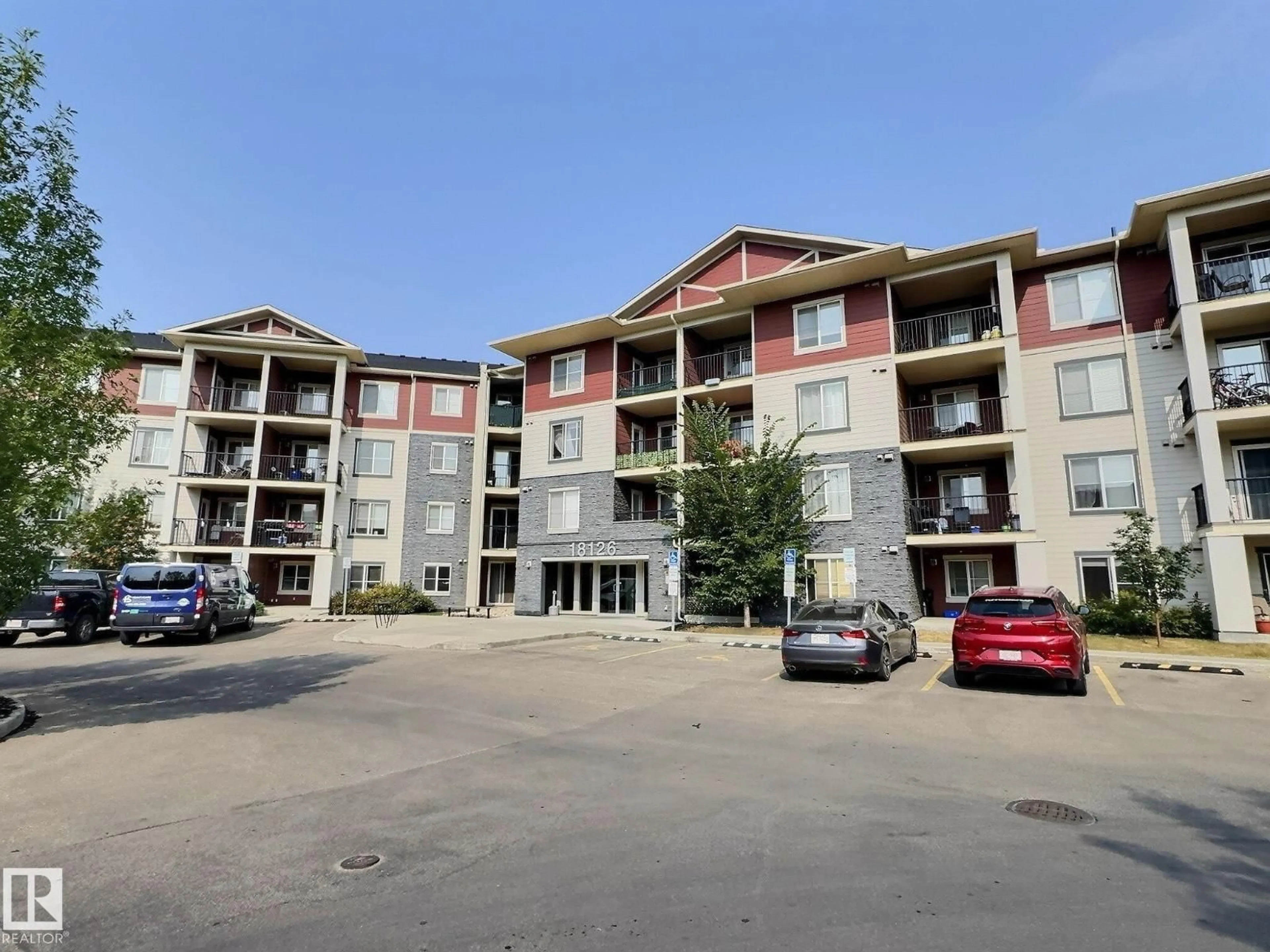 A pic from outside/outdoor area/front of a property/back of a property/a pic from drone, building for #406 - 18126 77 ST, Edmonton Alberta T5Z0N7