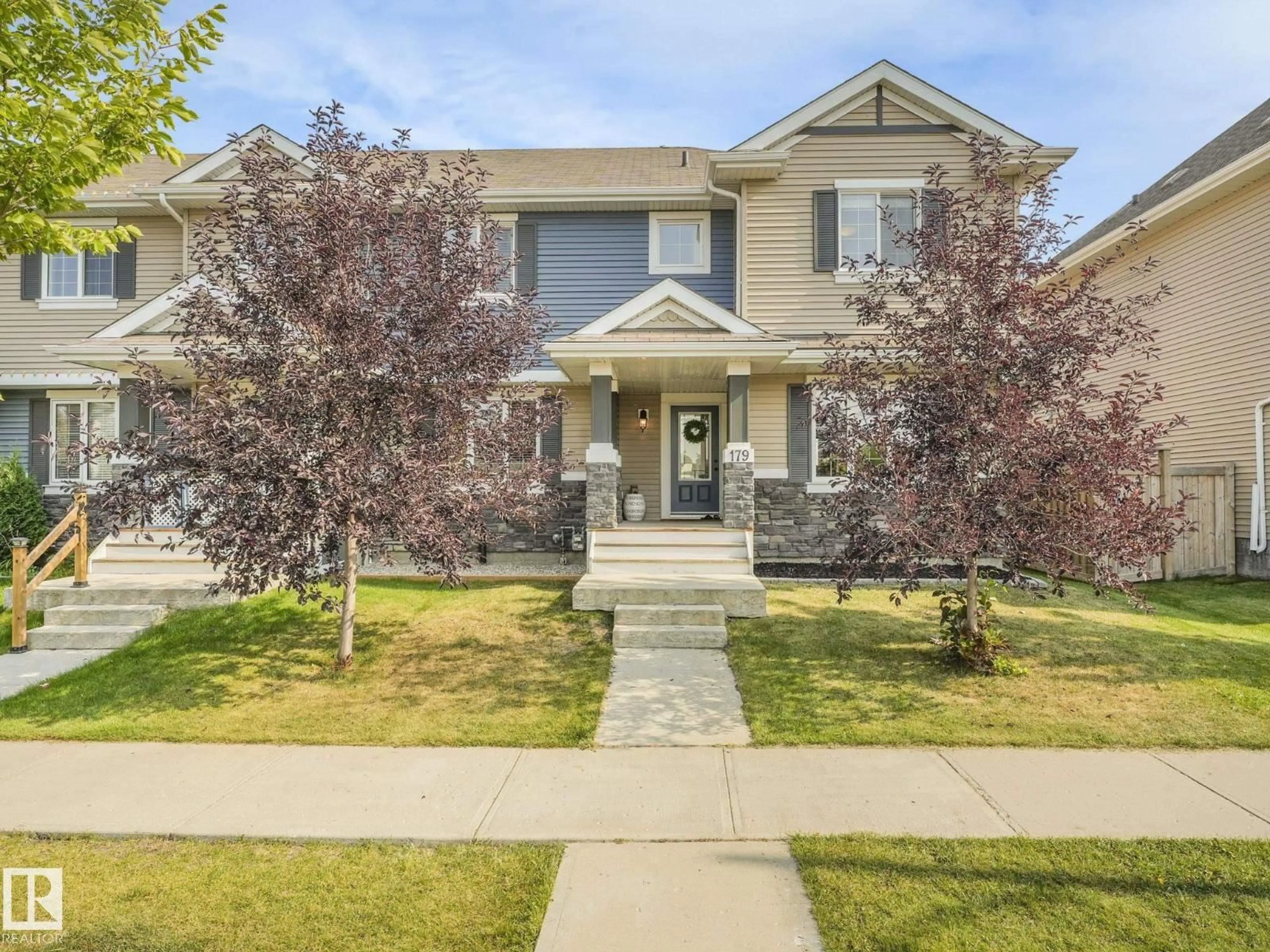 Home with vinyl exterior material, street for 179 ALLARD WY, Fort Saskatchewan Alberta T8L0T9