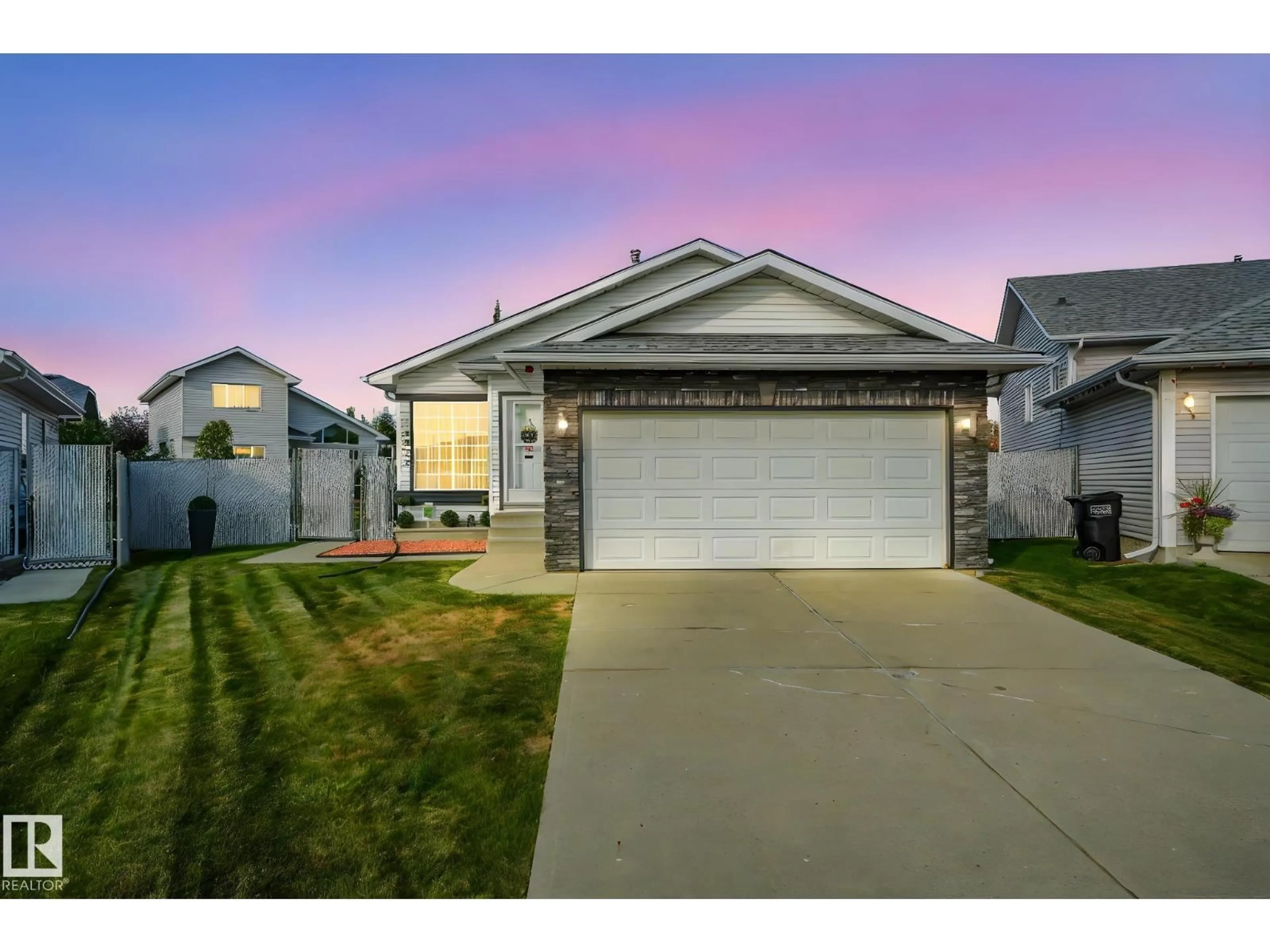 Home with vinyl exterior material, street for 12812 146 AV, Edmonton Alberta T6V1C5