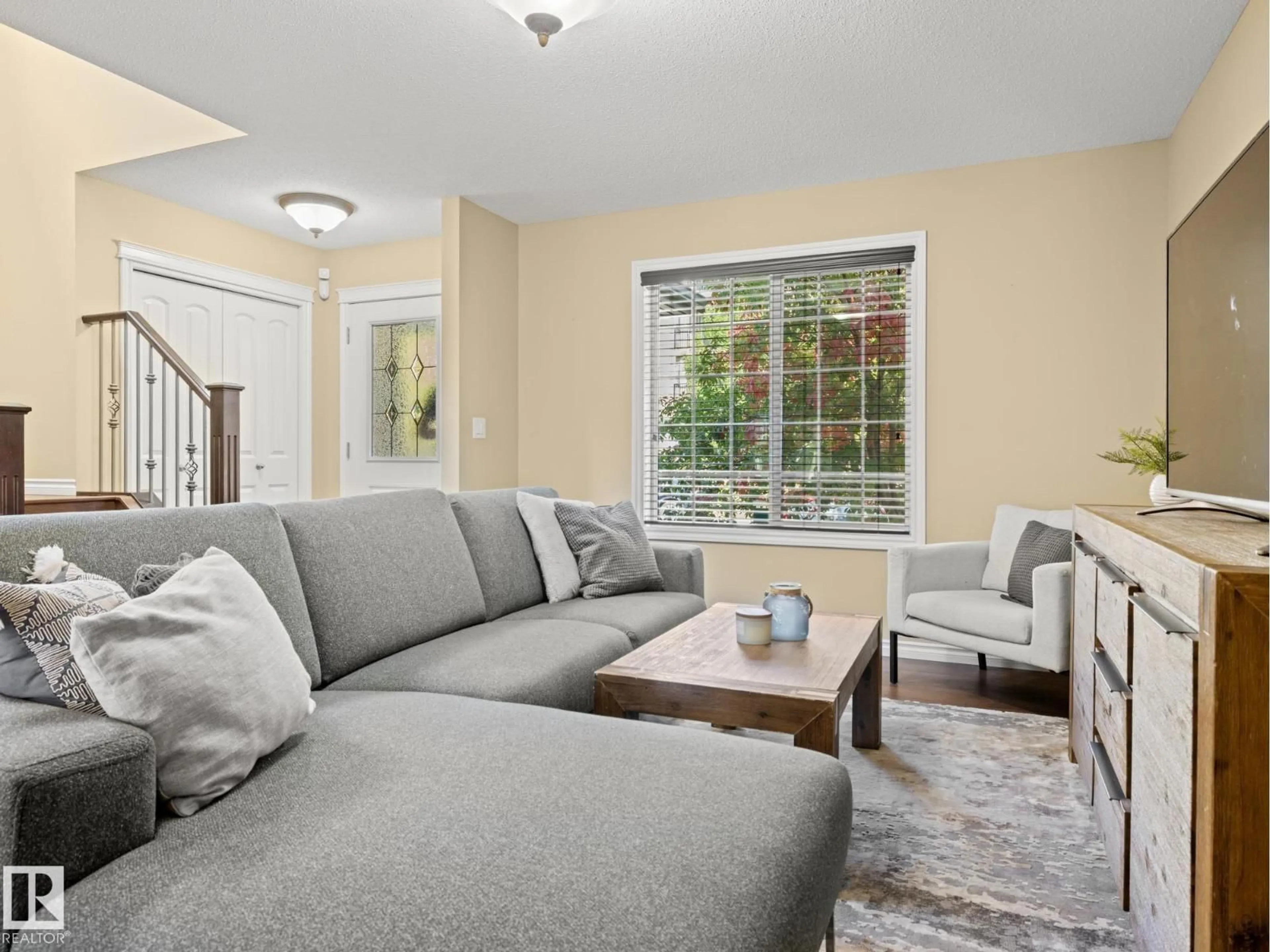 Living room with furniture, unknown for 273 MCCONACHIE DR, Edmonton Alberta T5Y0M7