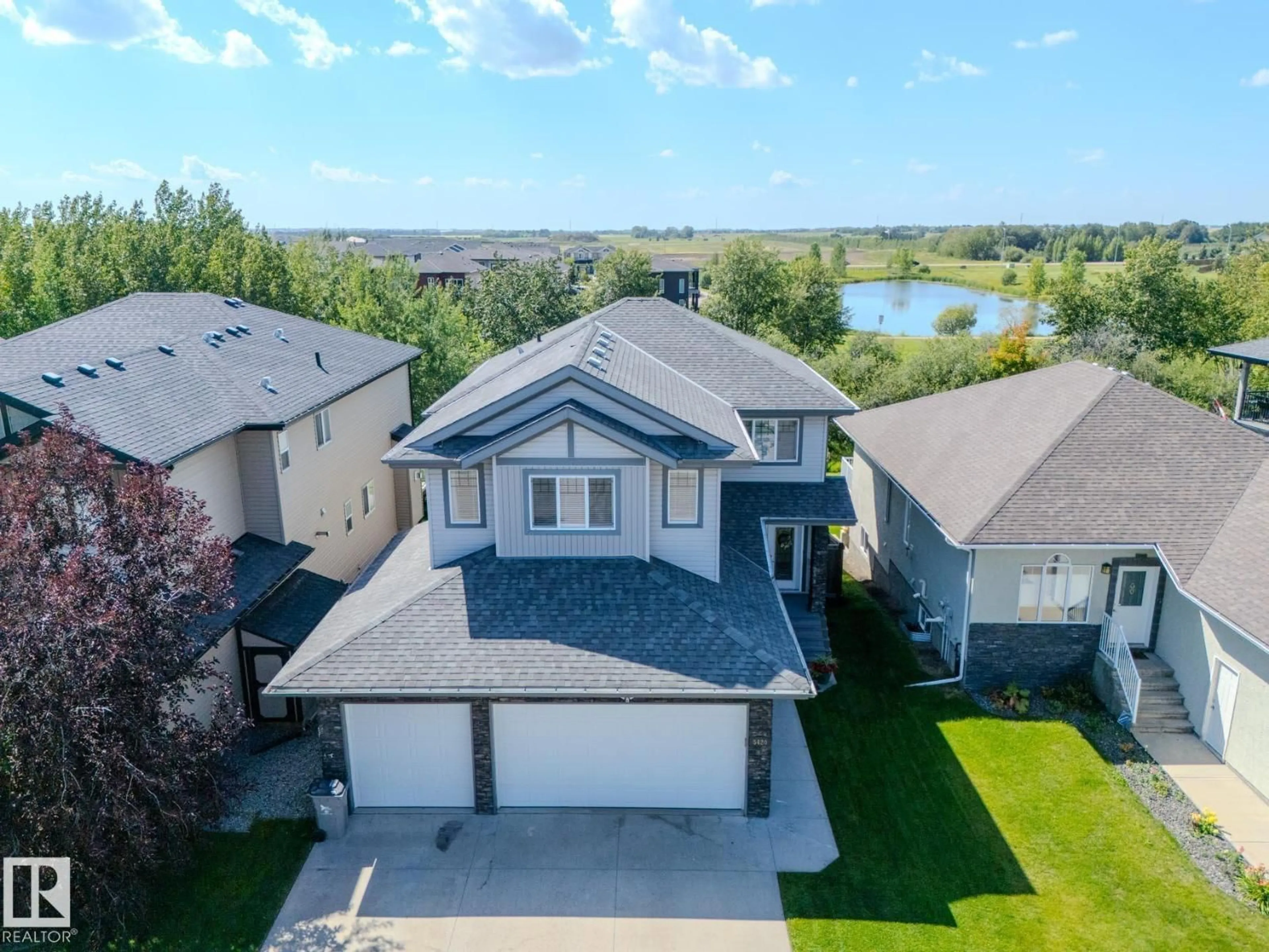 A pic from outside/outdoor area/front of a property/back of a property/a pic from drone, water/lake/river/ocean view for 5420 64 ST, Beaumont Alberta T4X0H2