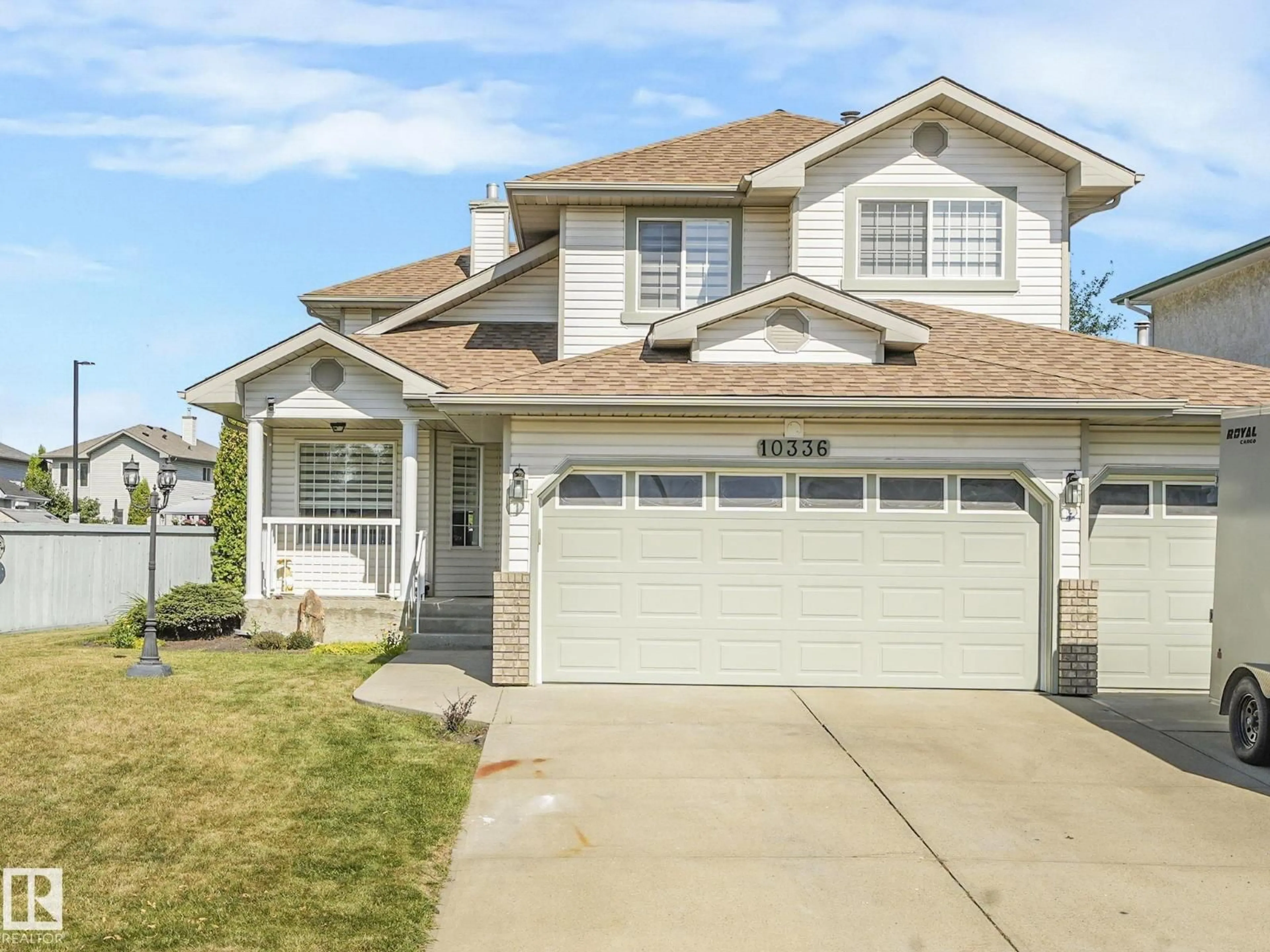 Home with vinyl exterior material, street for 10336 178 AV, Edmonton Alberta T5X5Y6