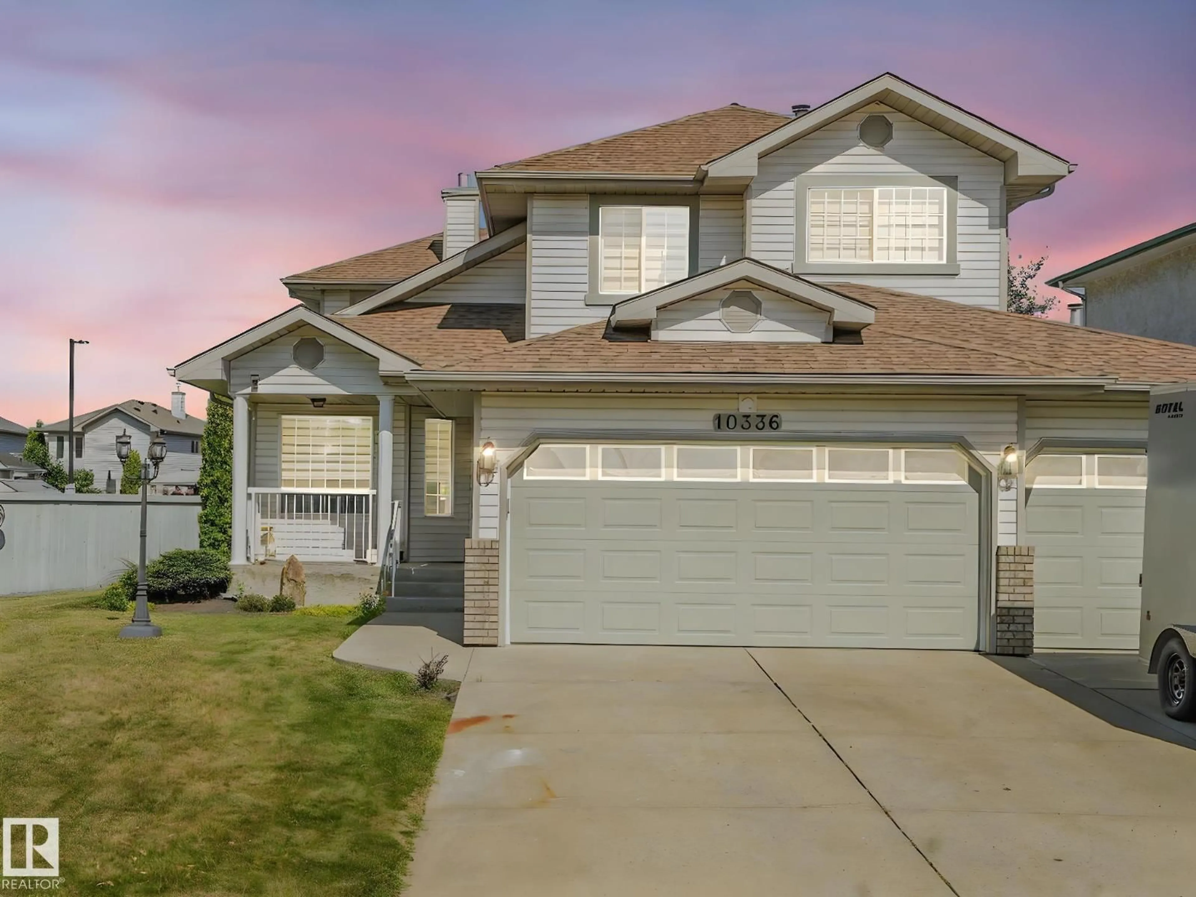 Home with vinyl exterior material, street for 10336 178 AV, Edmonton Alberta T5X5Y6