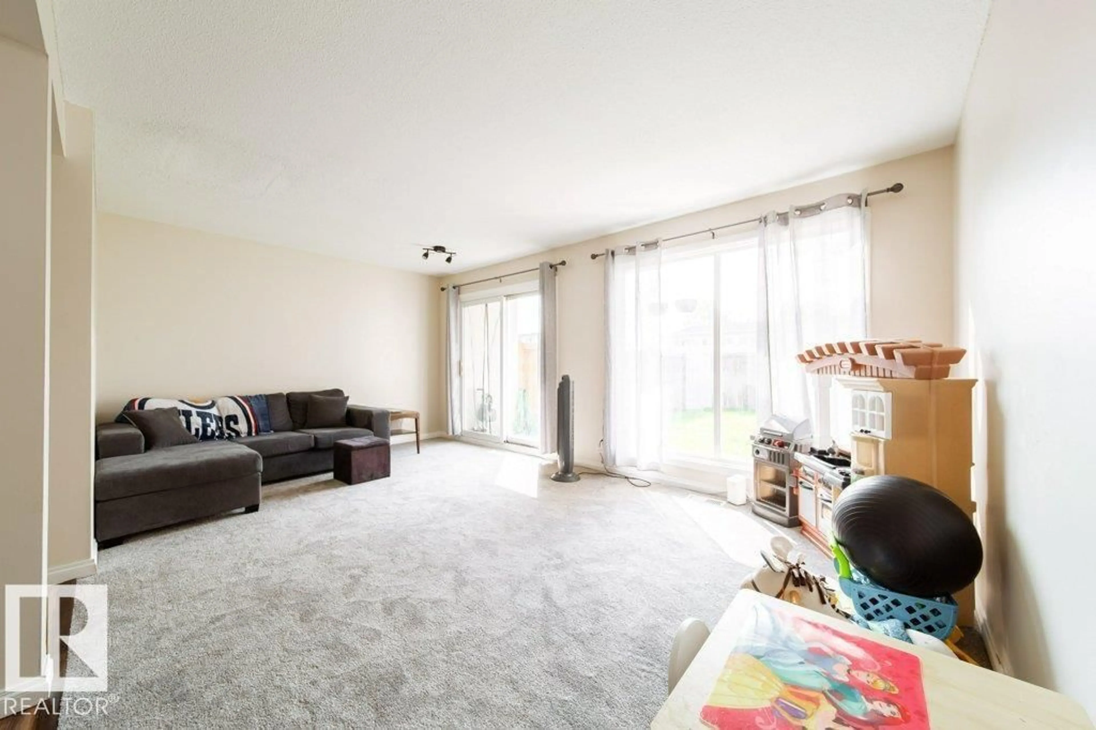 Living room with furniture, unknown for 13201 81 ST, Edmonton Alberta T5C1N6