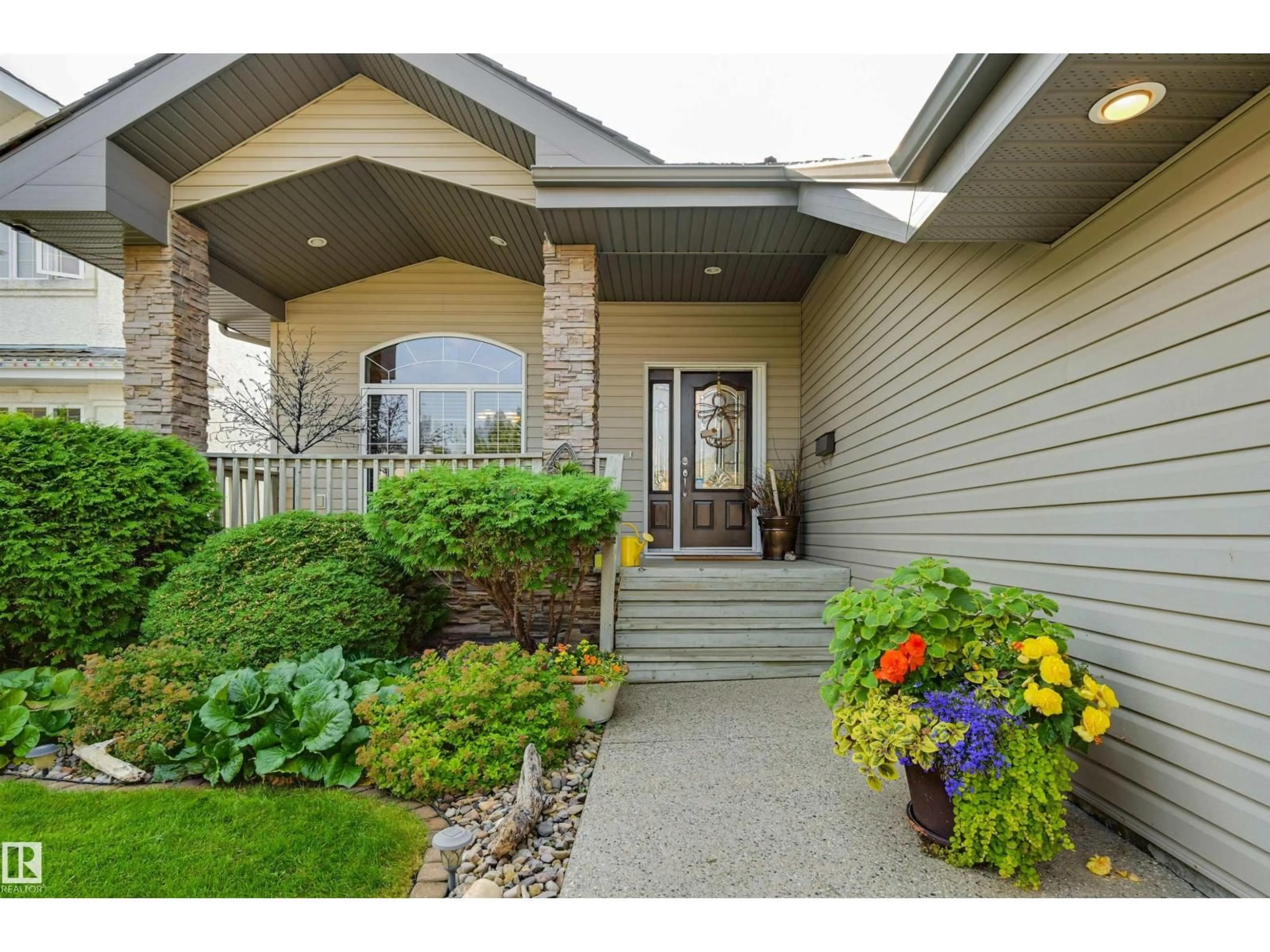 Home with vinyl exterior material, street for 939 HALIBURTON RD, Edmonton Alberta T6R2Z6