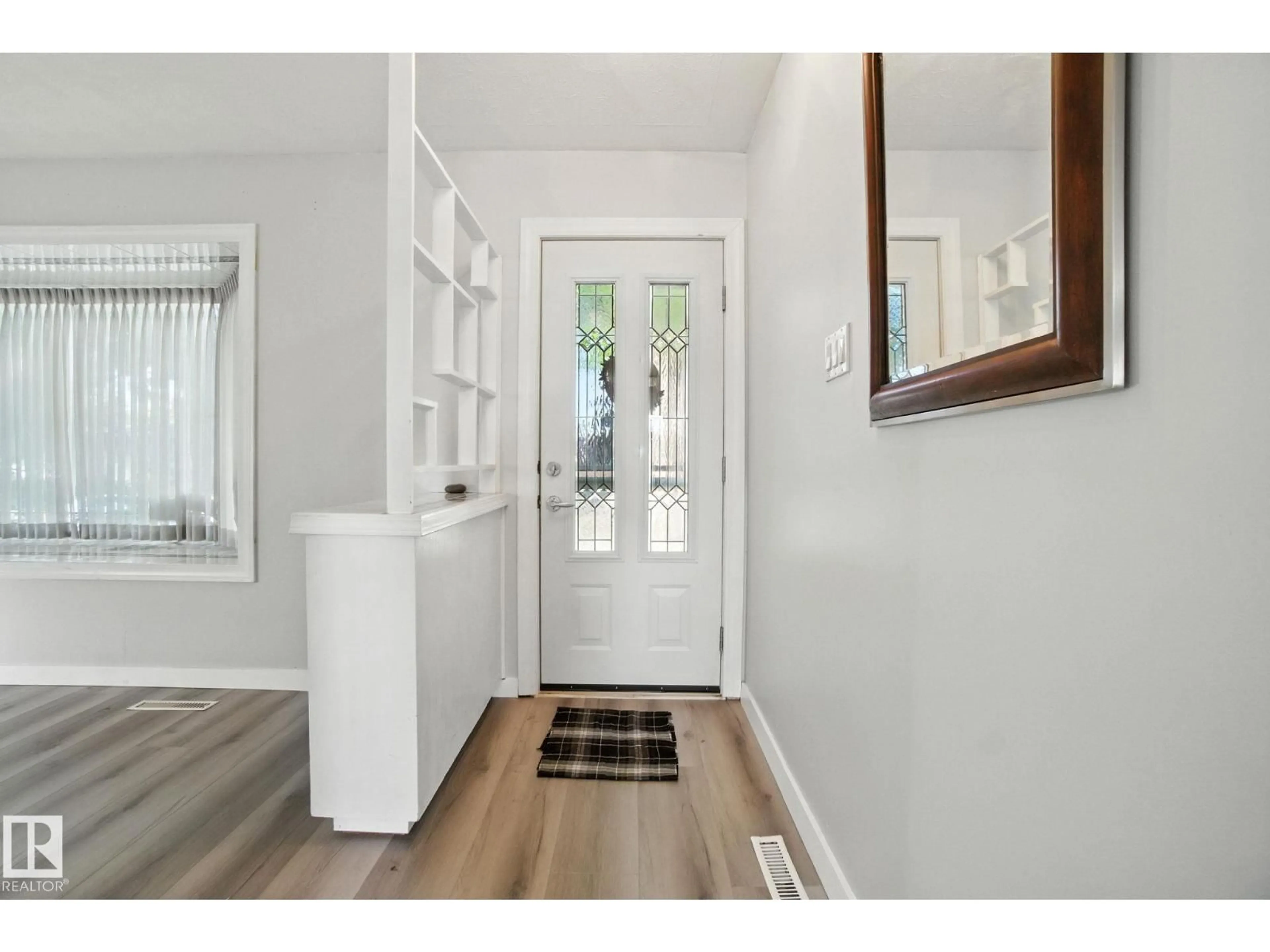Indoor entryway for 15711 89 AV, Edmonton Alberta T5R4R4