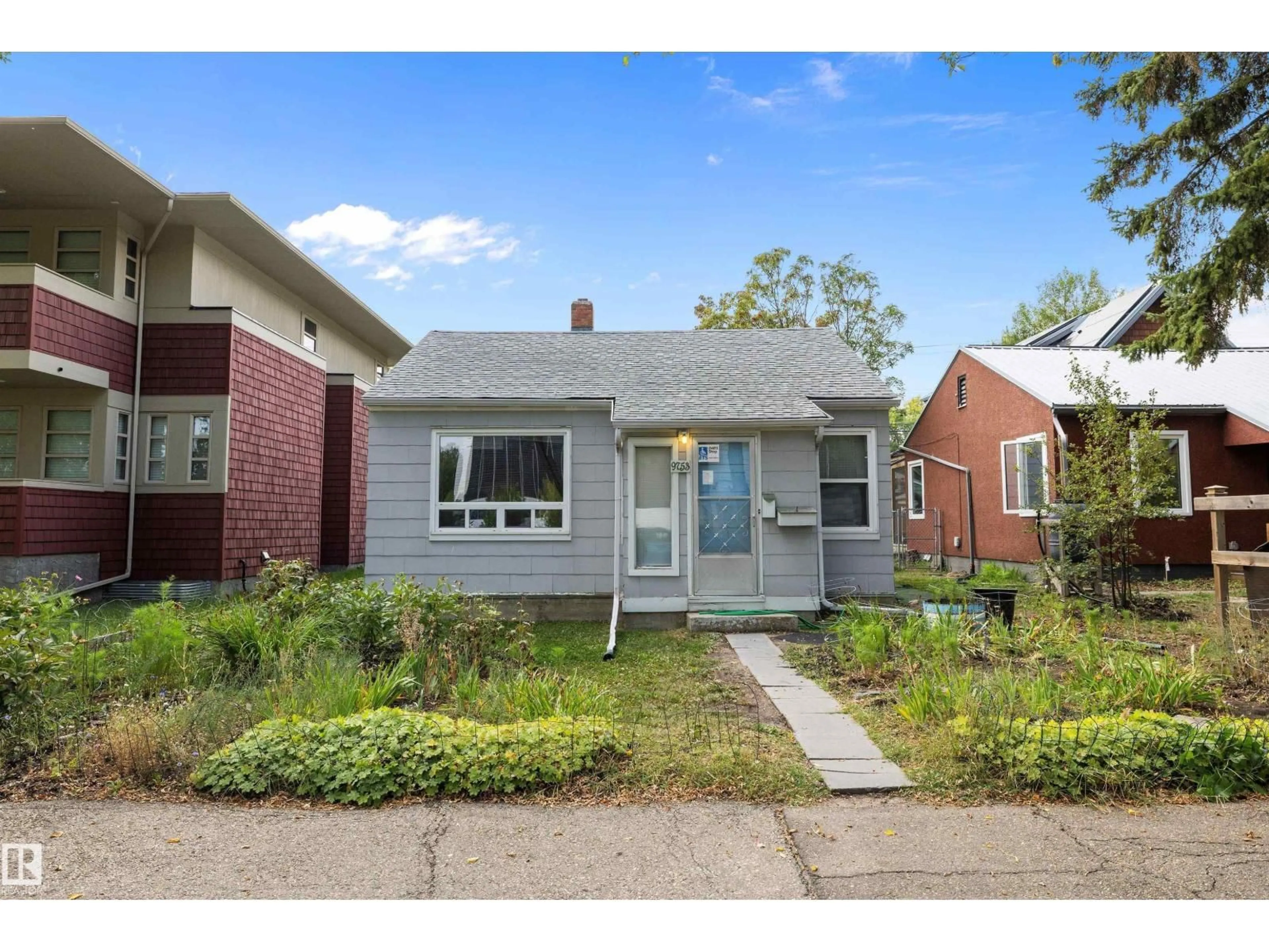 Home with brick exterior material, street for 9753 79 AV, Edmonton Alberta T6E1P9
