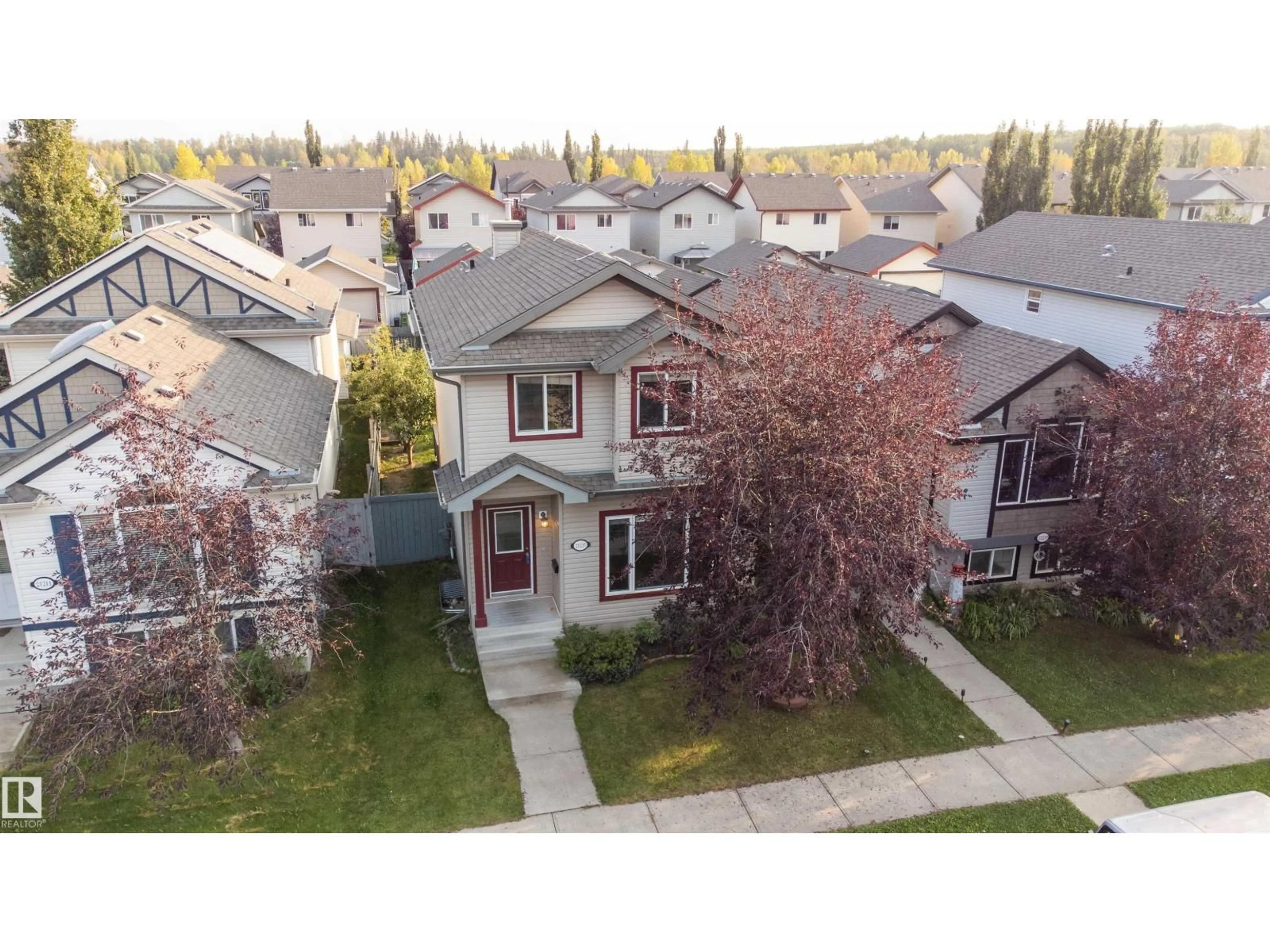 A pic from outside/outdoor area/front of a property/back of a property/a pic from drone, street for NW - 21215 59 AVE, Edmonton Alberta T6M0H5