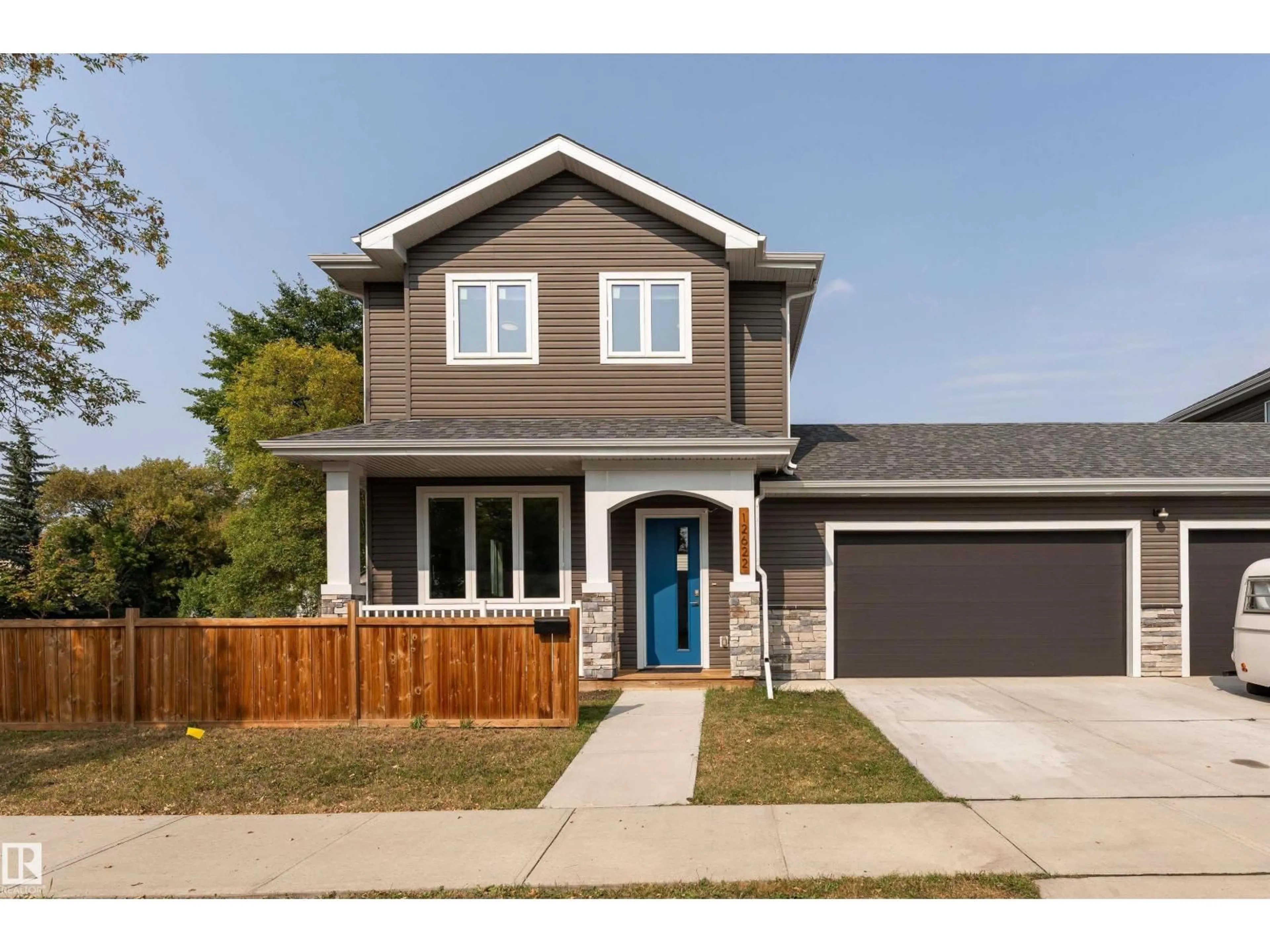 Home with brick exterior material, street for 12622 120 AV, Edmonton Alberta T5L0Z5
