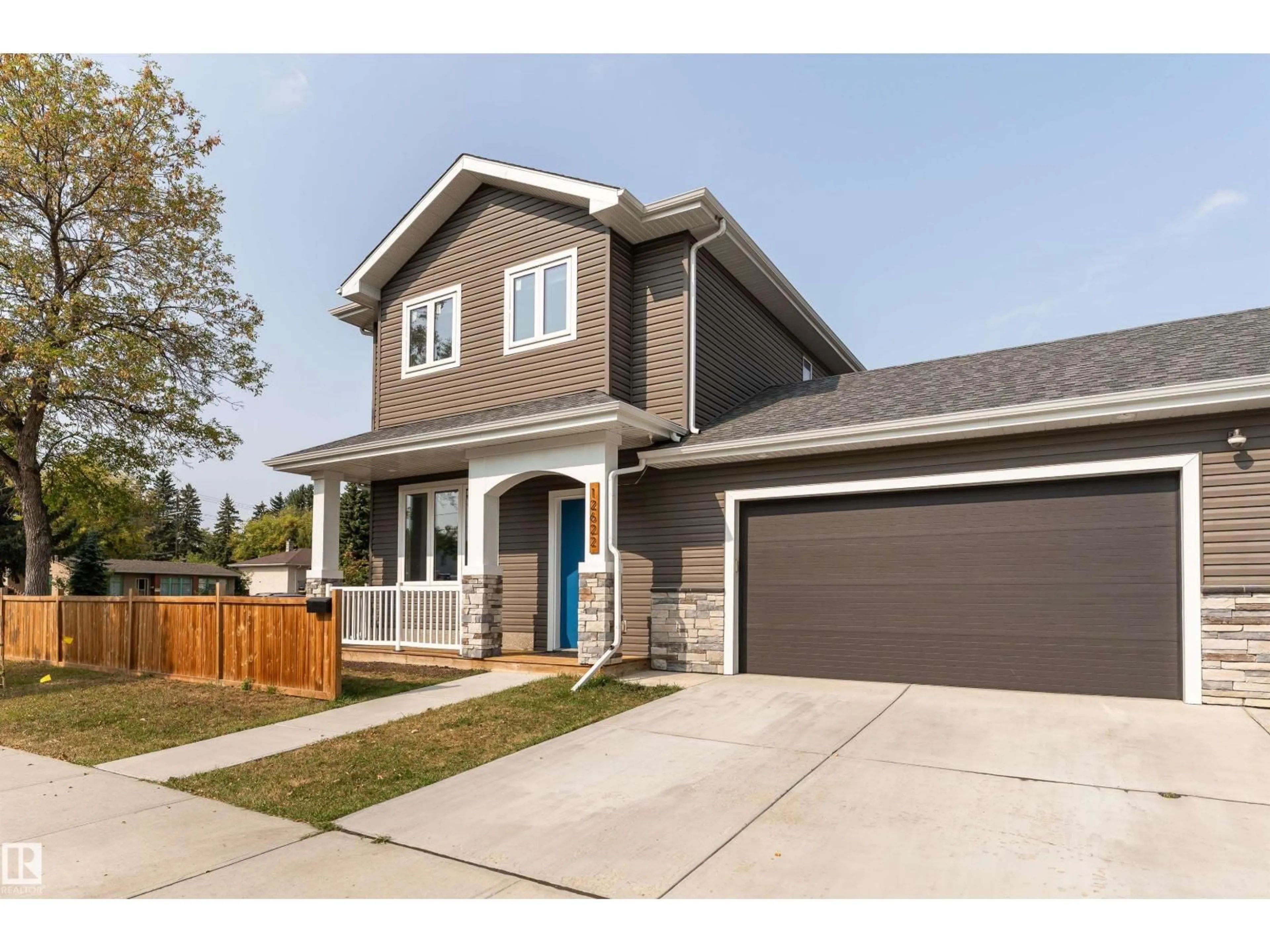 Home with brick exterior material, street for 12622 120 AV, Edmonton Alberta T5L0Z5