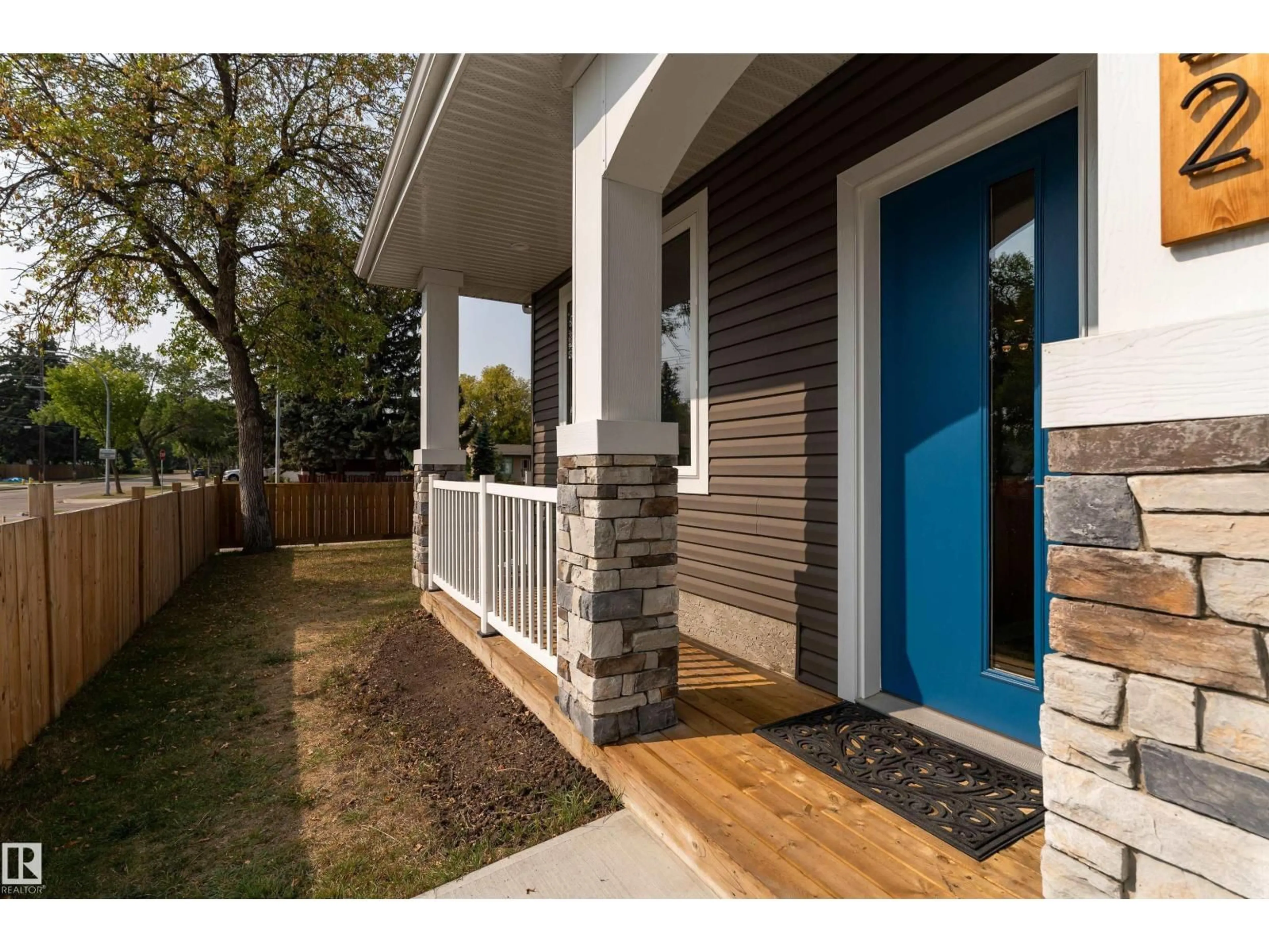Home with vinyl exterior material, street for 12622 120 AV, Edmonton Alberta T5L0Z5