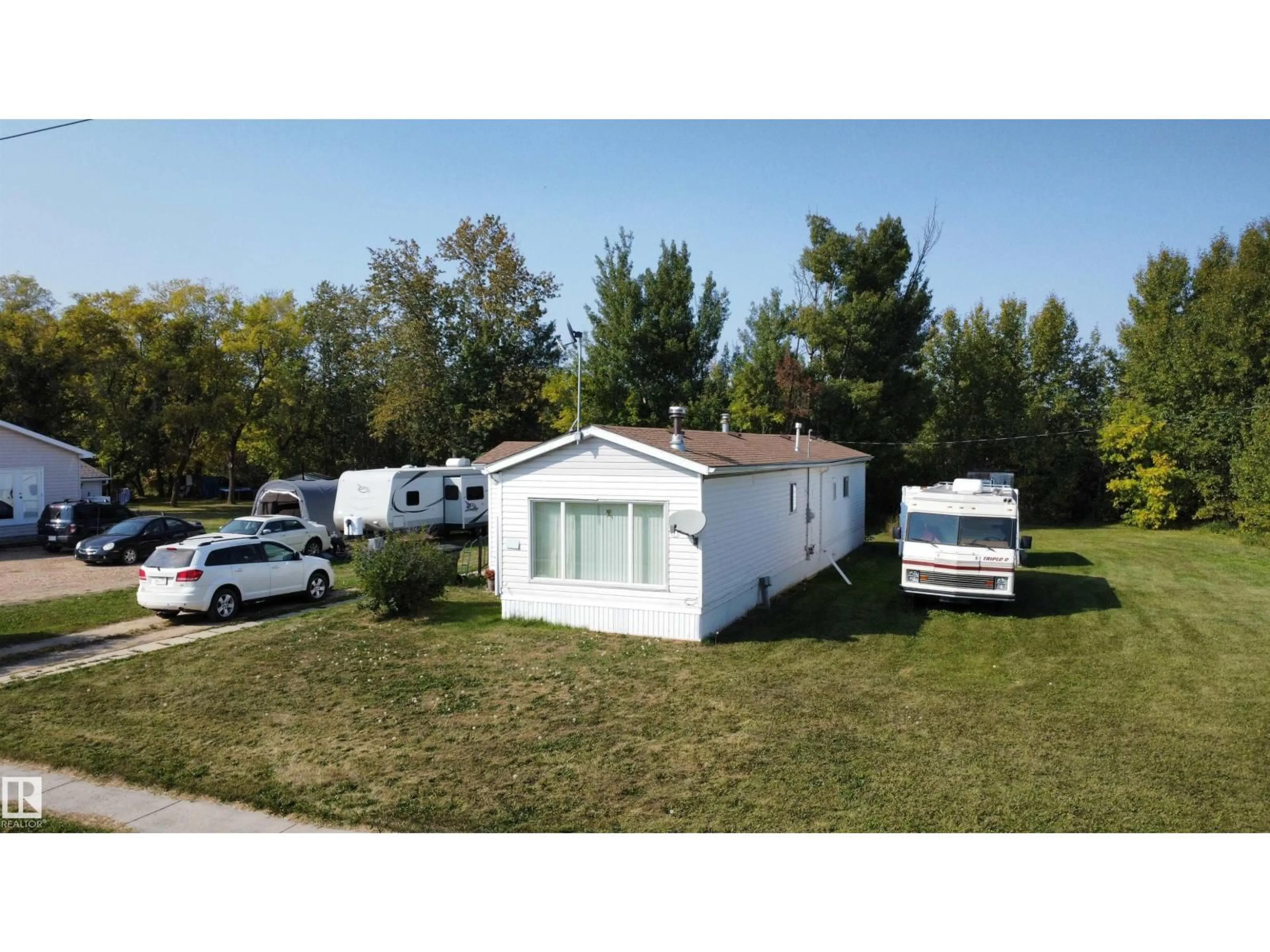 A pic from outside/outdoor area/front of a property/back of a property/a pic from drone, street for 5002 50 AV, Dapp Alberta T0G0S0