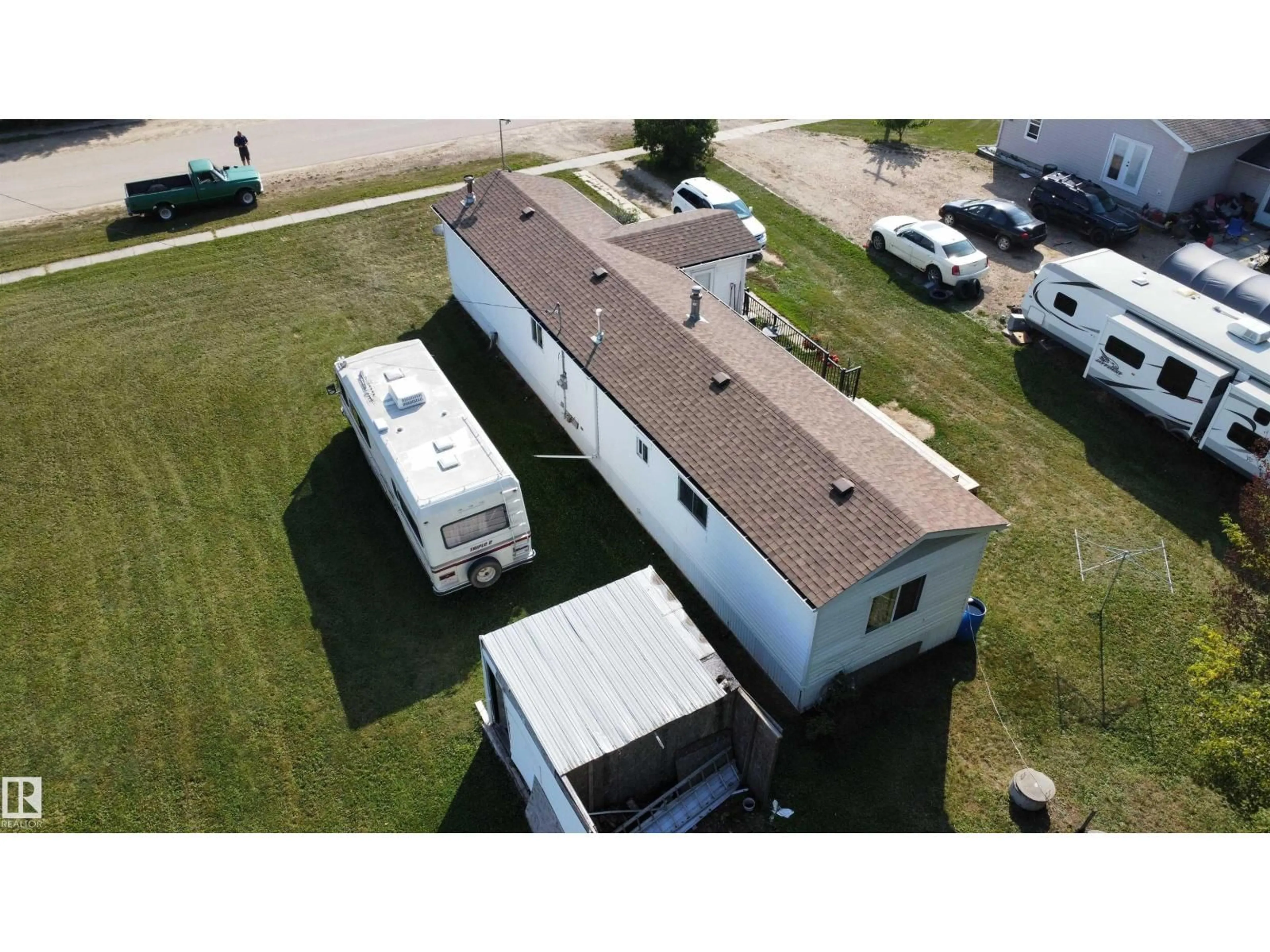 A pic from outside/outdoor area/front of a property/back of a property/a pic from drone, building for 5002 50 AV, Dapp Alberta T0G0S0