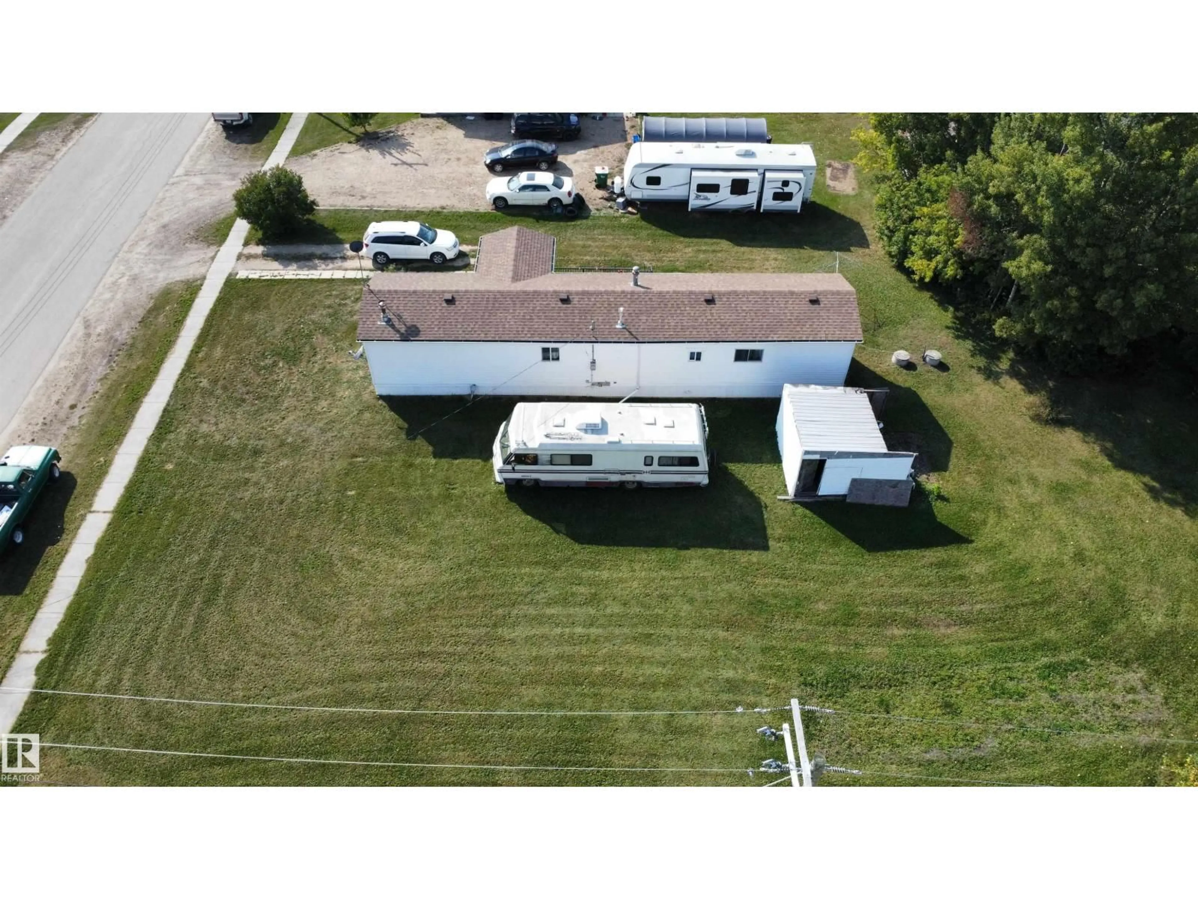 A pic from outside/outdoor area/front of a property/back of a property/a pic from drone, building for 5002 50 AV, Dapp Alberta T0G0S0
