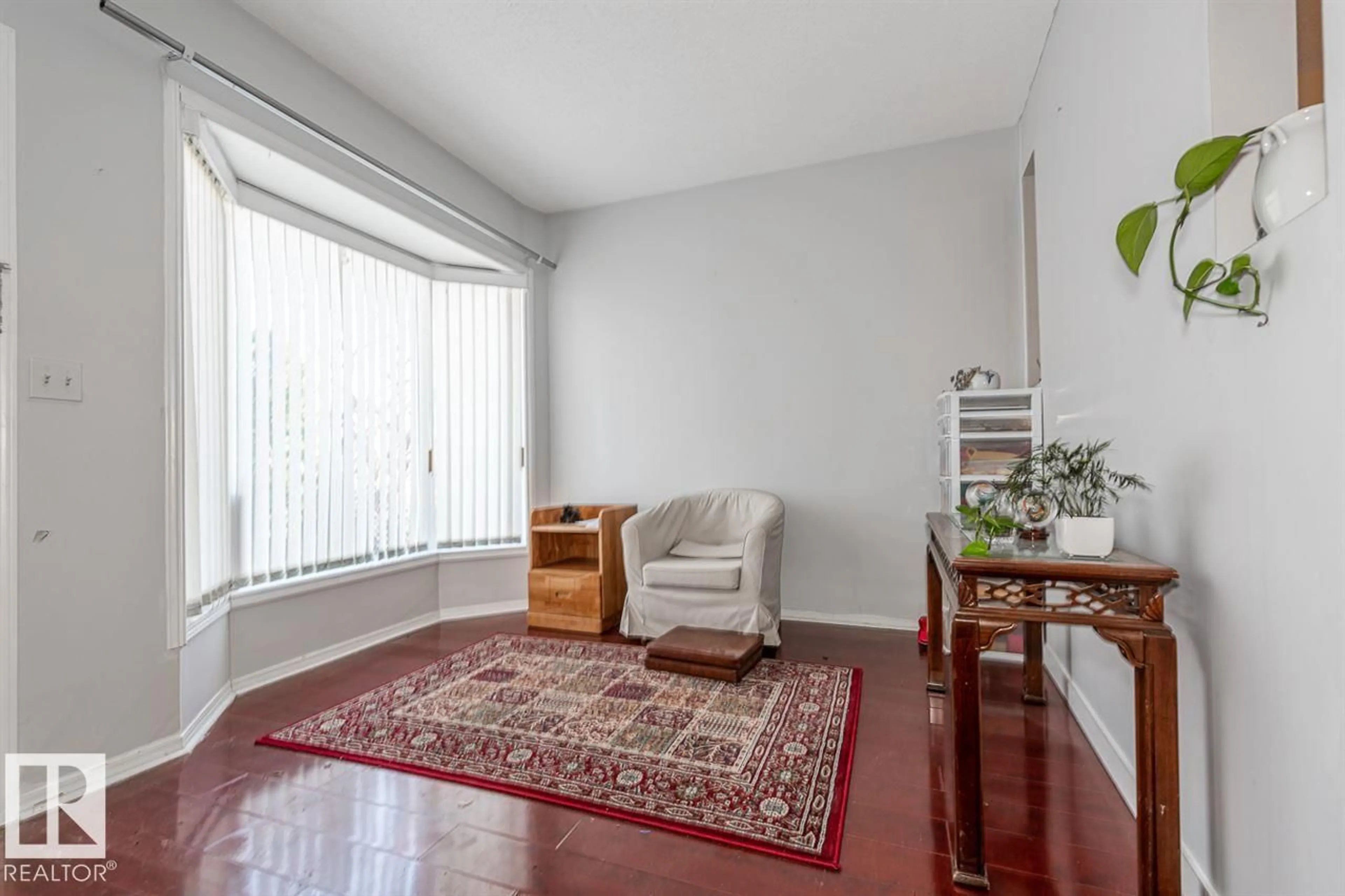Living room with furniture, unknown for 9332 106A AV, Edmonton Alberta T5H0S7